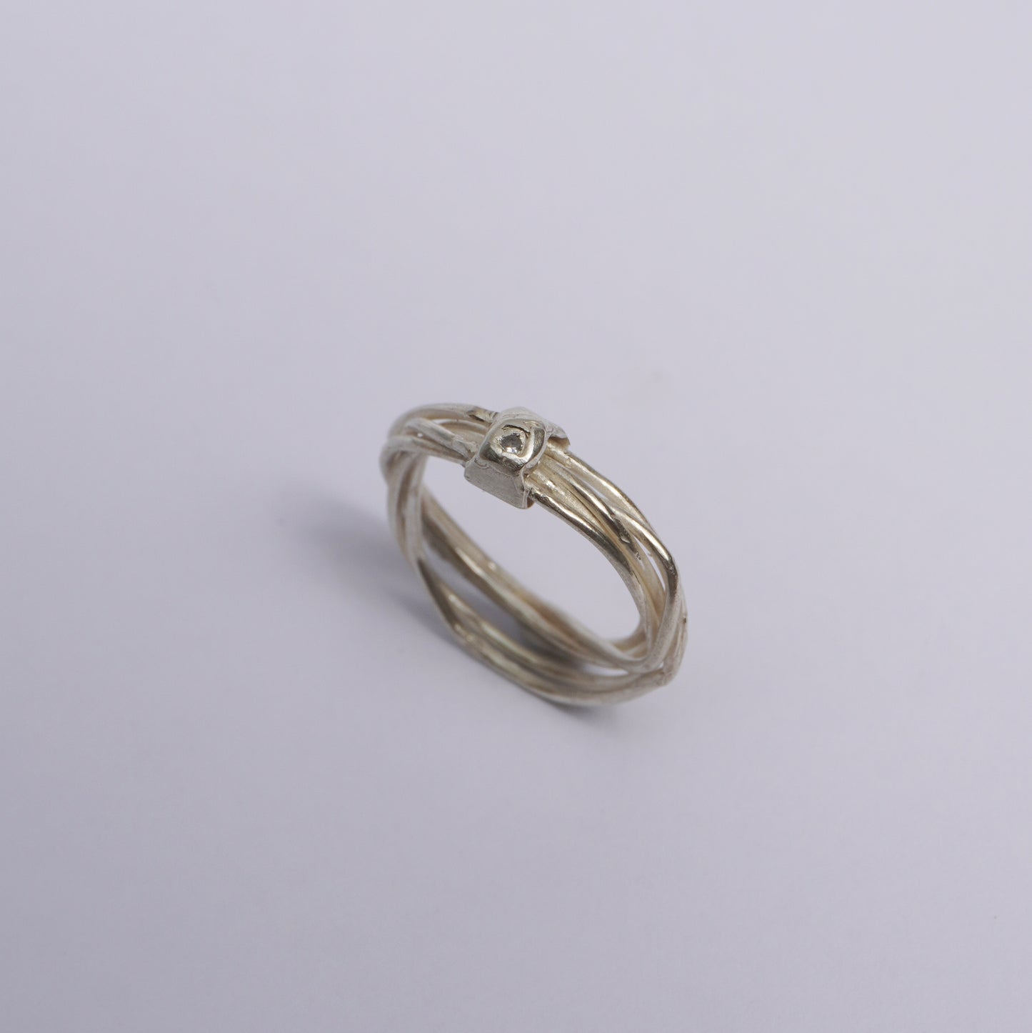 Interwoven Ring with Tiny Stone – Unique Piece