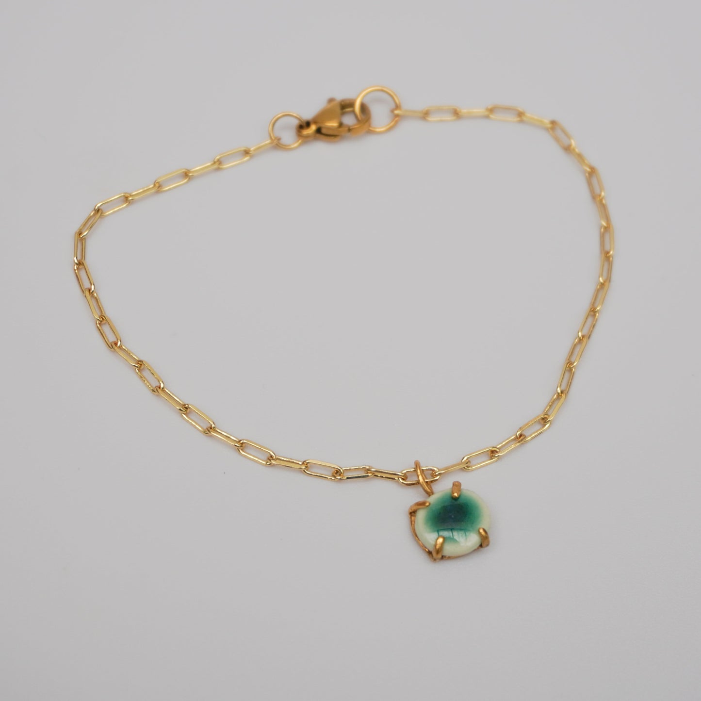 Bracelet with porcelain pendant