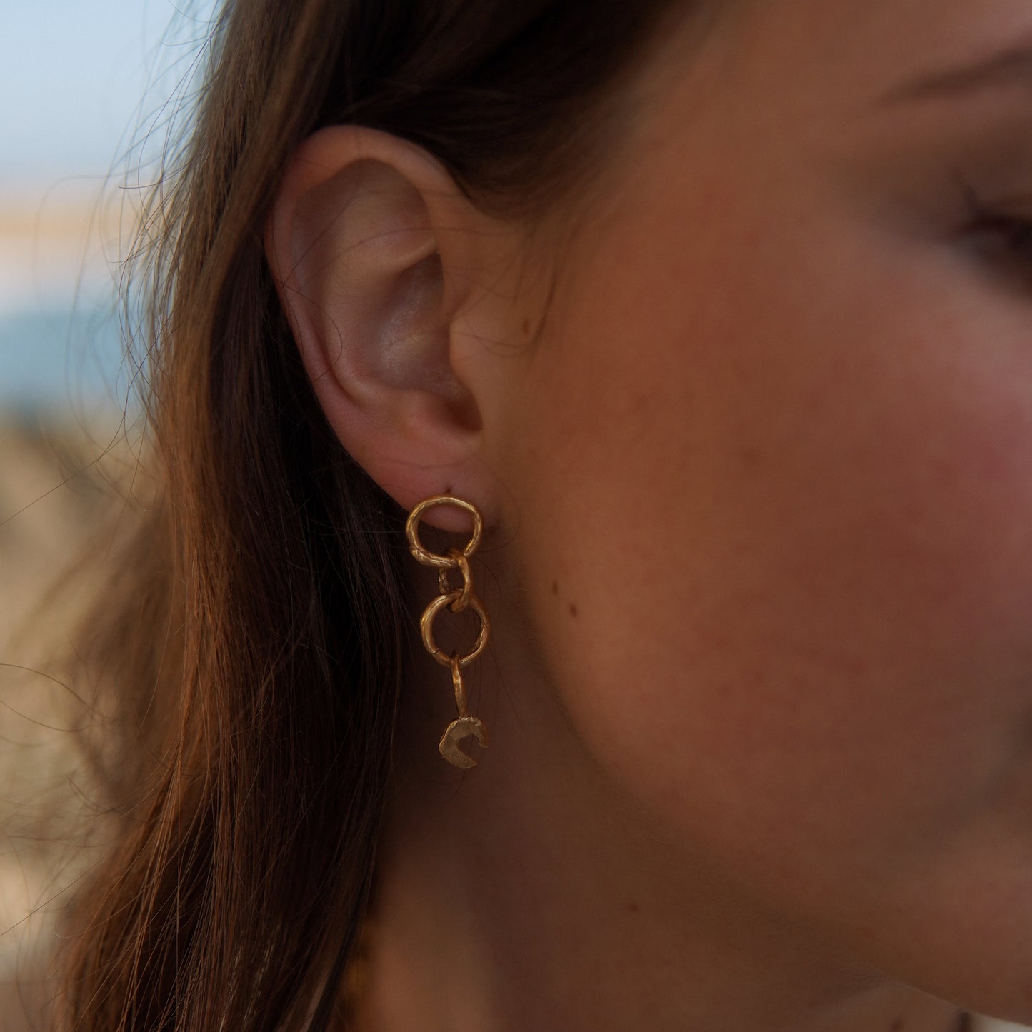 Single Handmade Golden Earring wit Moon Pendant