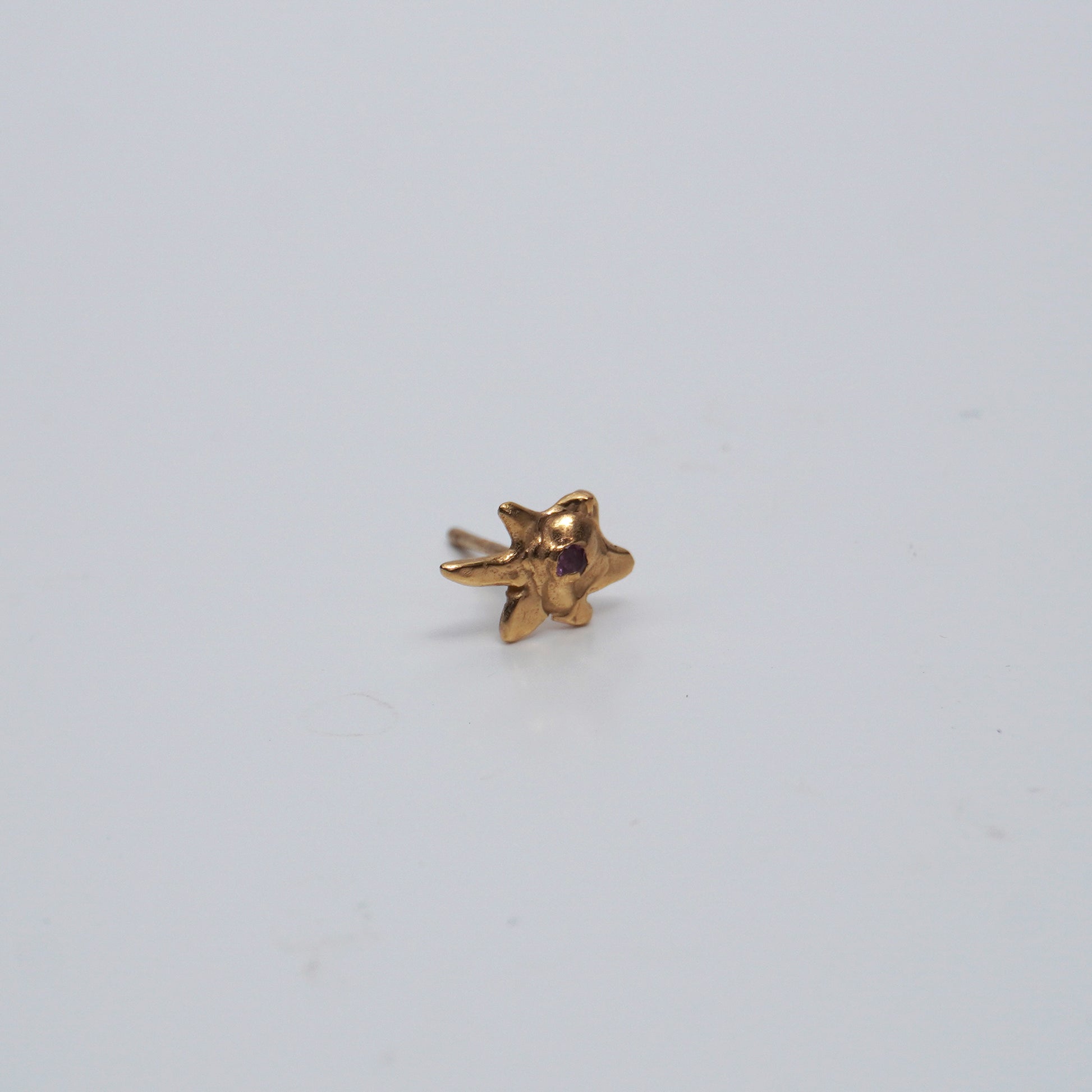Gold, handmade, artisanal, celestial, organic, star-shaped earring small stud with purple stone