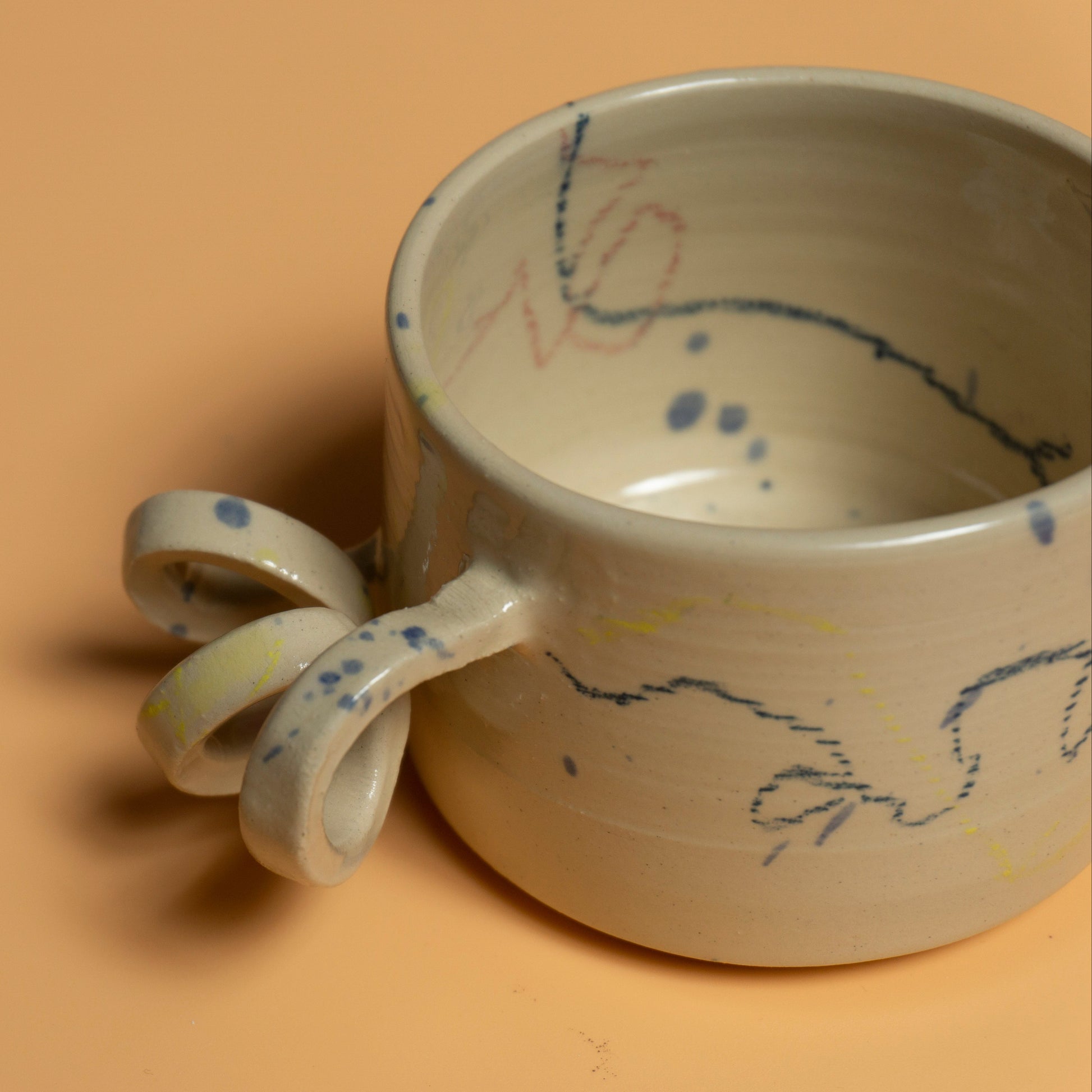 GIVE IT A TWIST handmade ceramics mug multicolor crayons and splashes