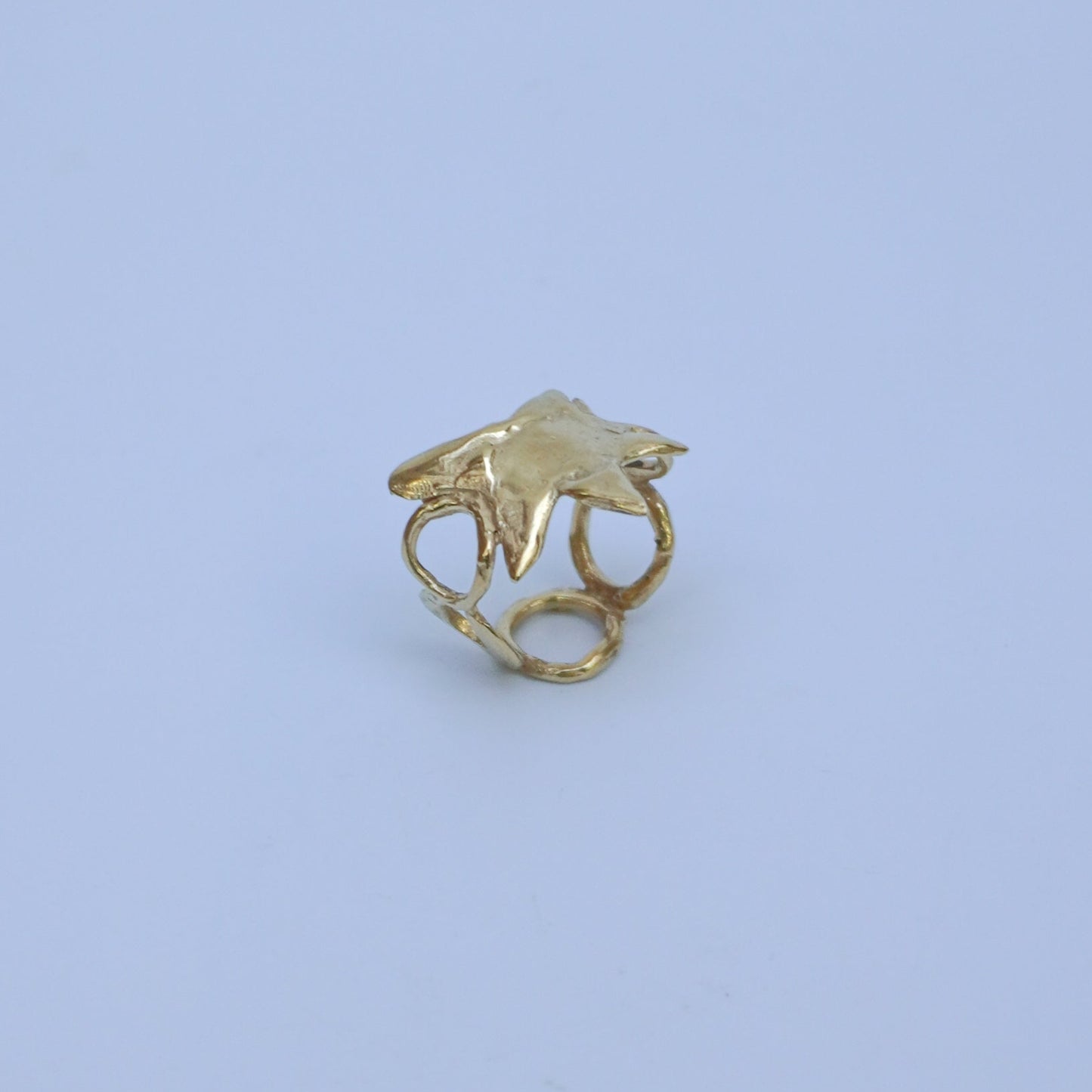 Gold-plated brass, gold-plated silver or silver ring with a star and circles