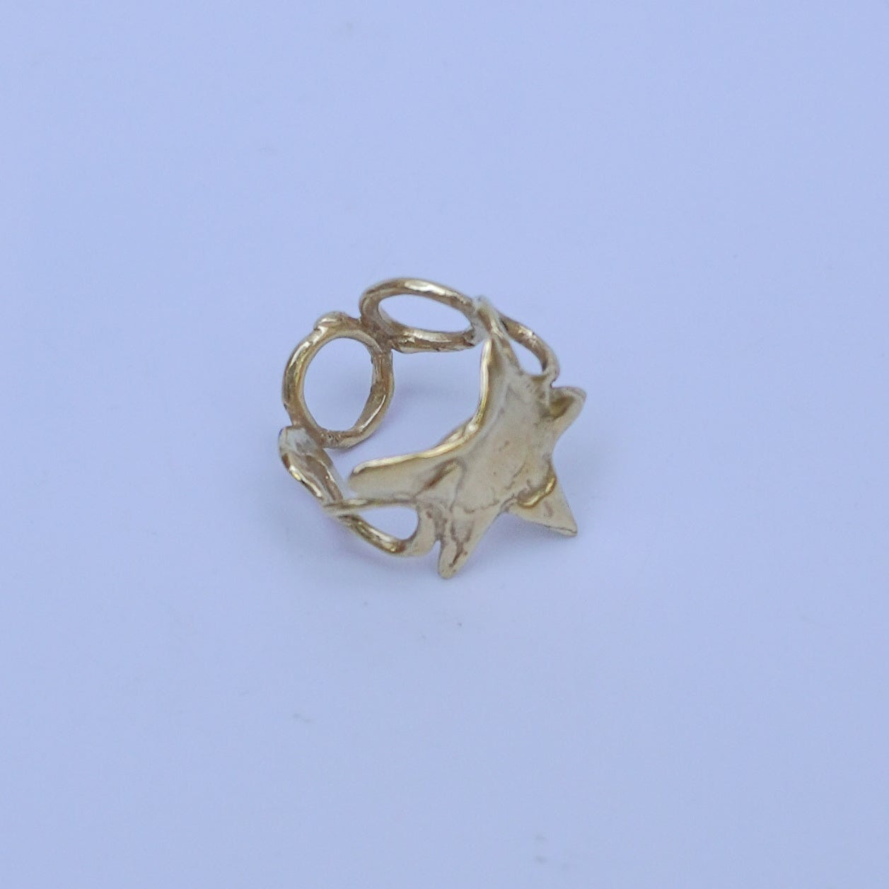 Gold-plated brass, gold-plated silver or silver ring with a star and circles
