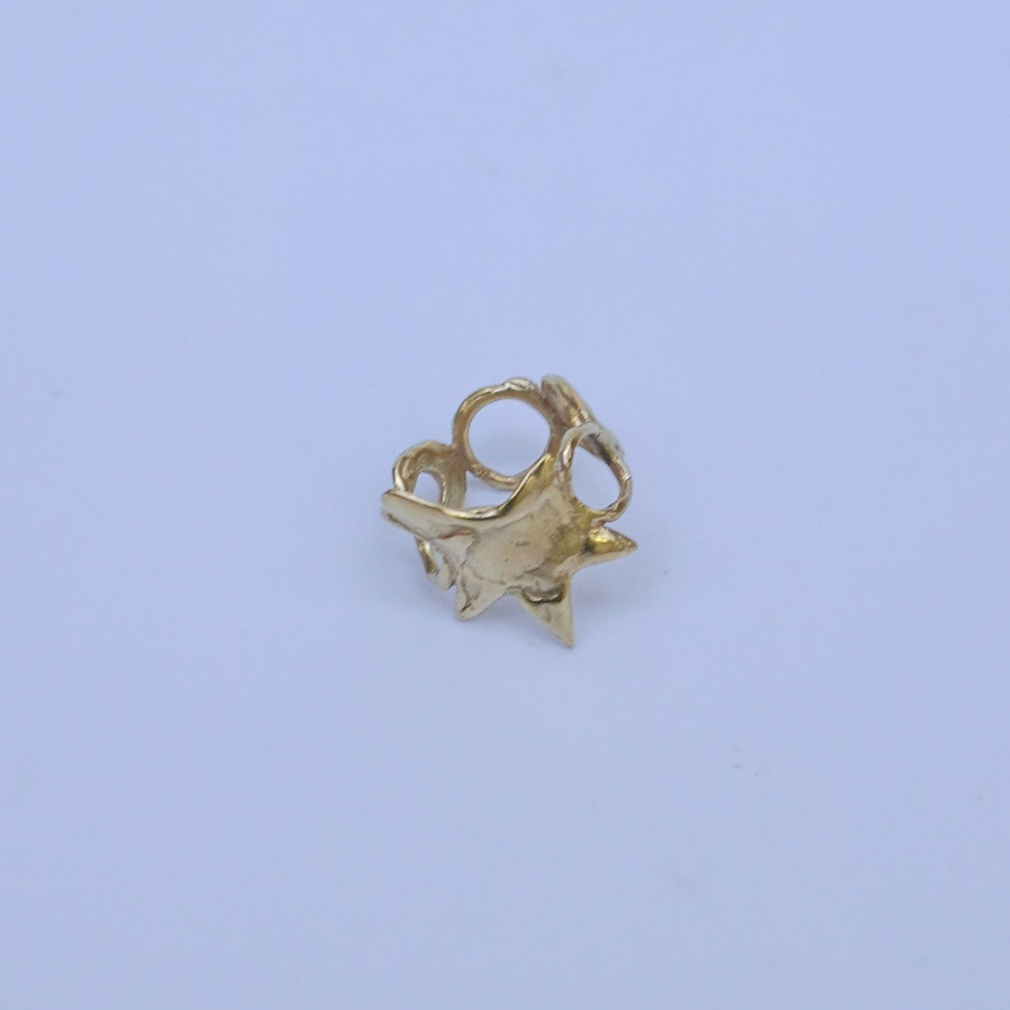 Gold-plated brass, gold-plated silver or silver ring with a star and circles