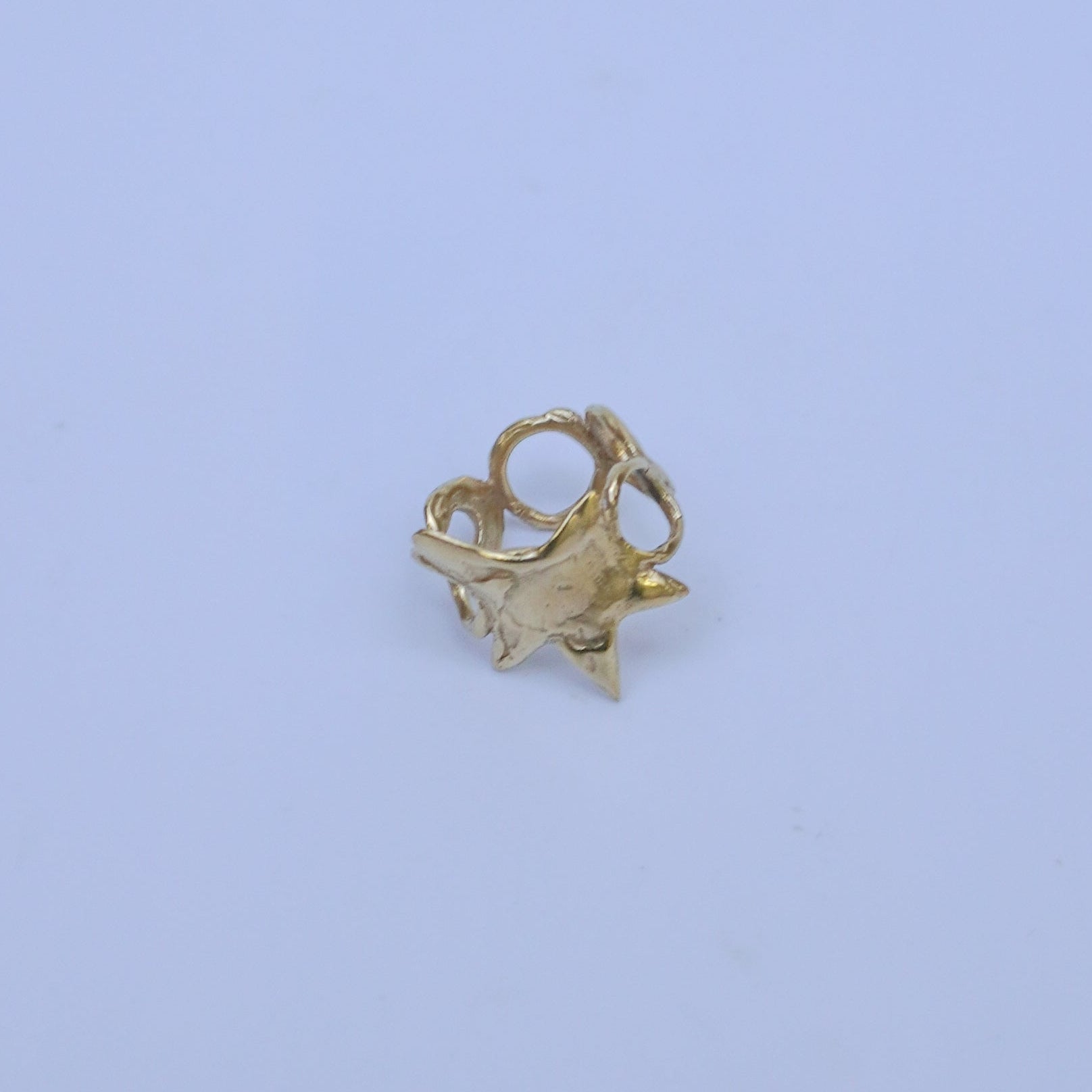 Gold-plated brass, gold-plated silver or silver ring with a star and circles