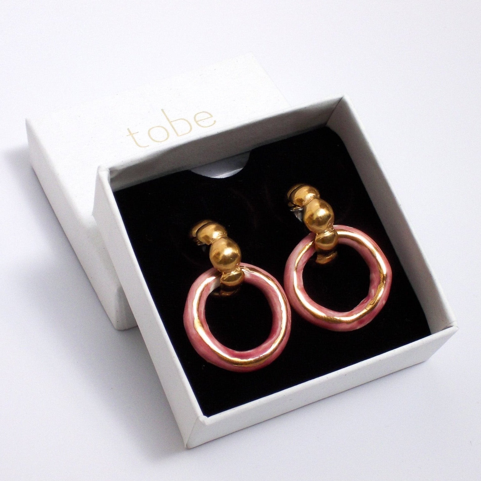 dancing youthful innocence earring gold luster pink hoop