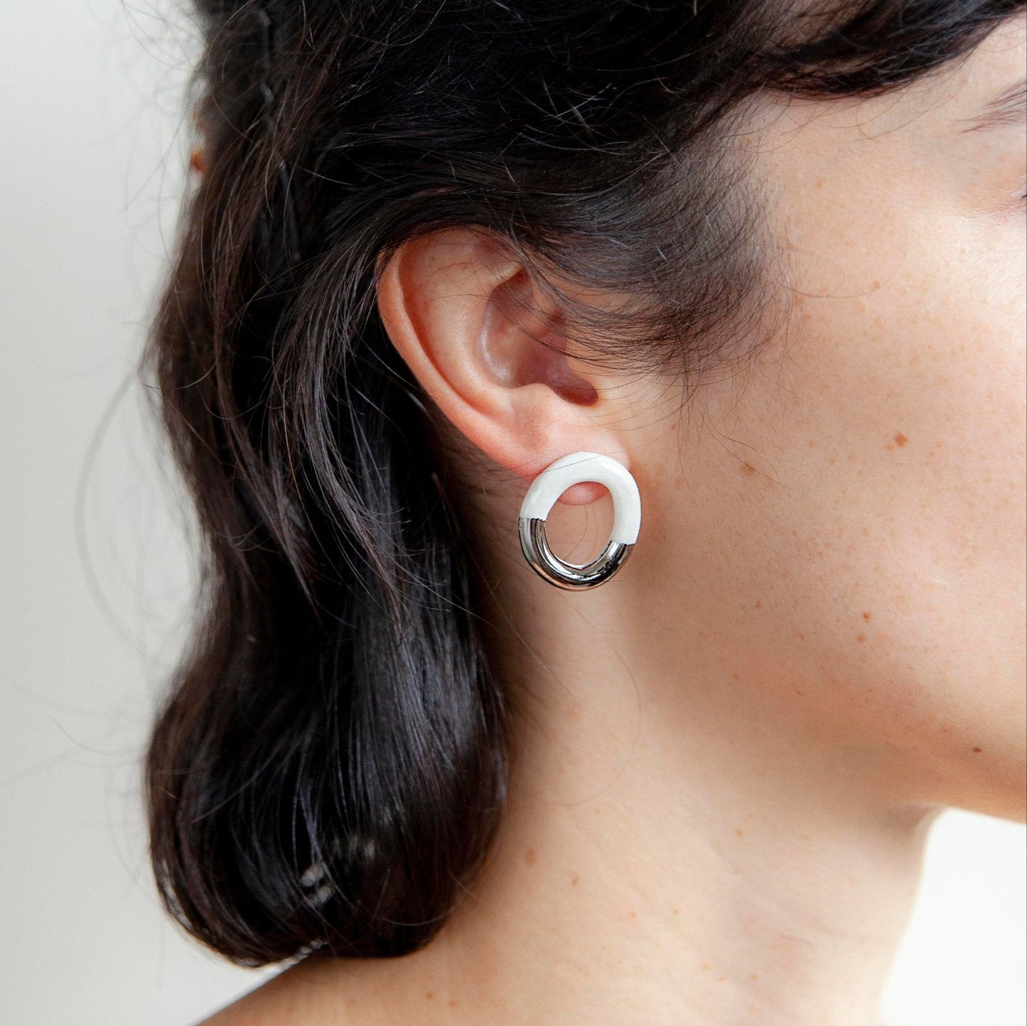 rooted radiance white earring silver luster hoop