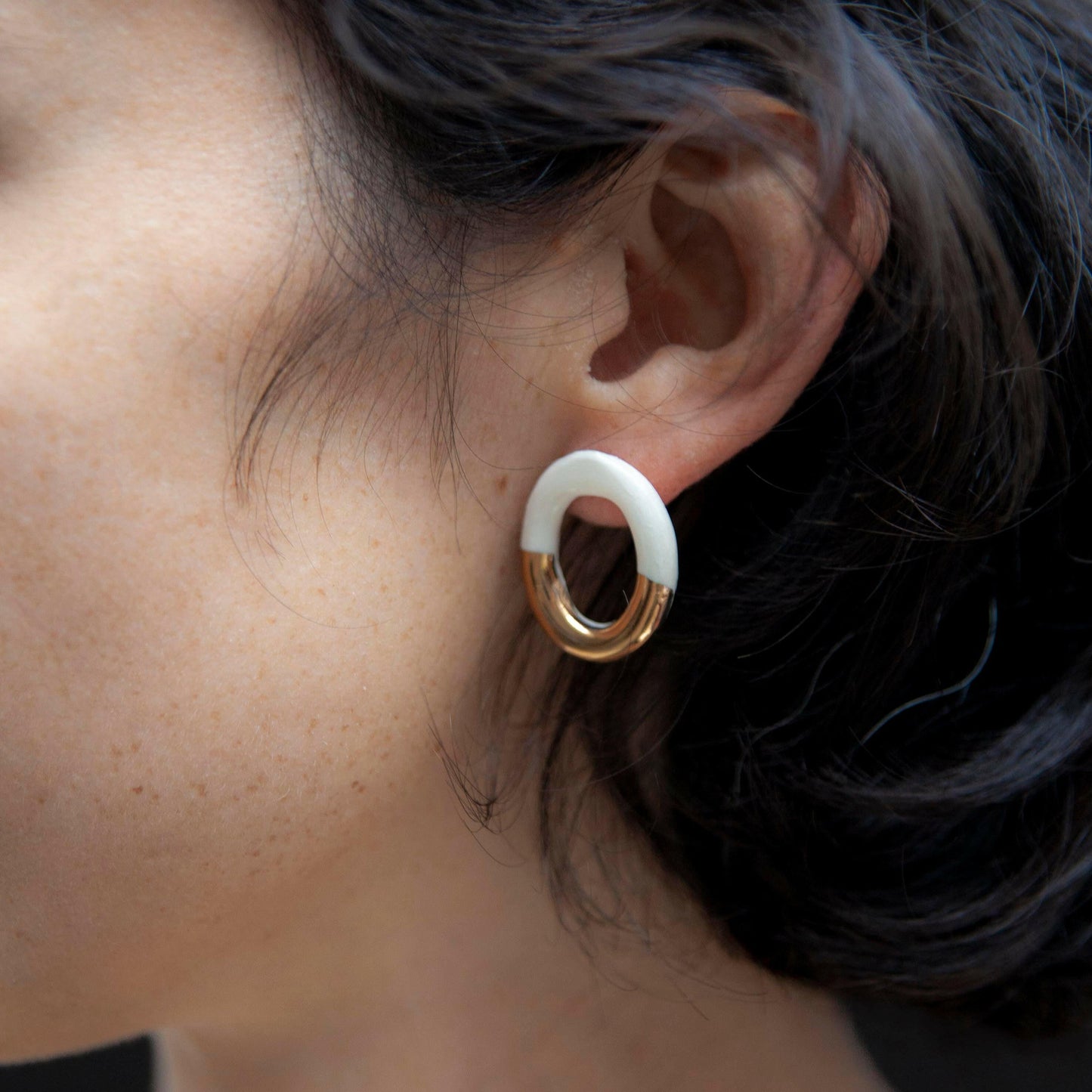 rooted radiance porcelain earring gold luster white hoop