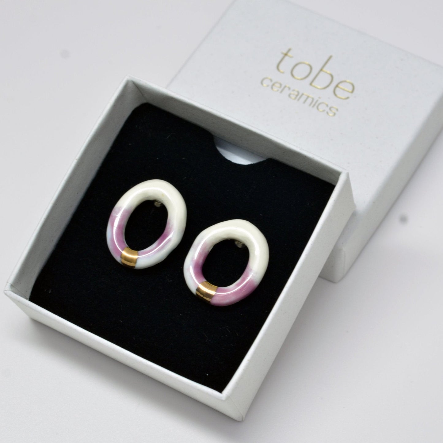 youthful innocence porcelain earring stud hoop white pink gold luster