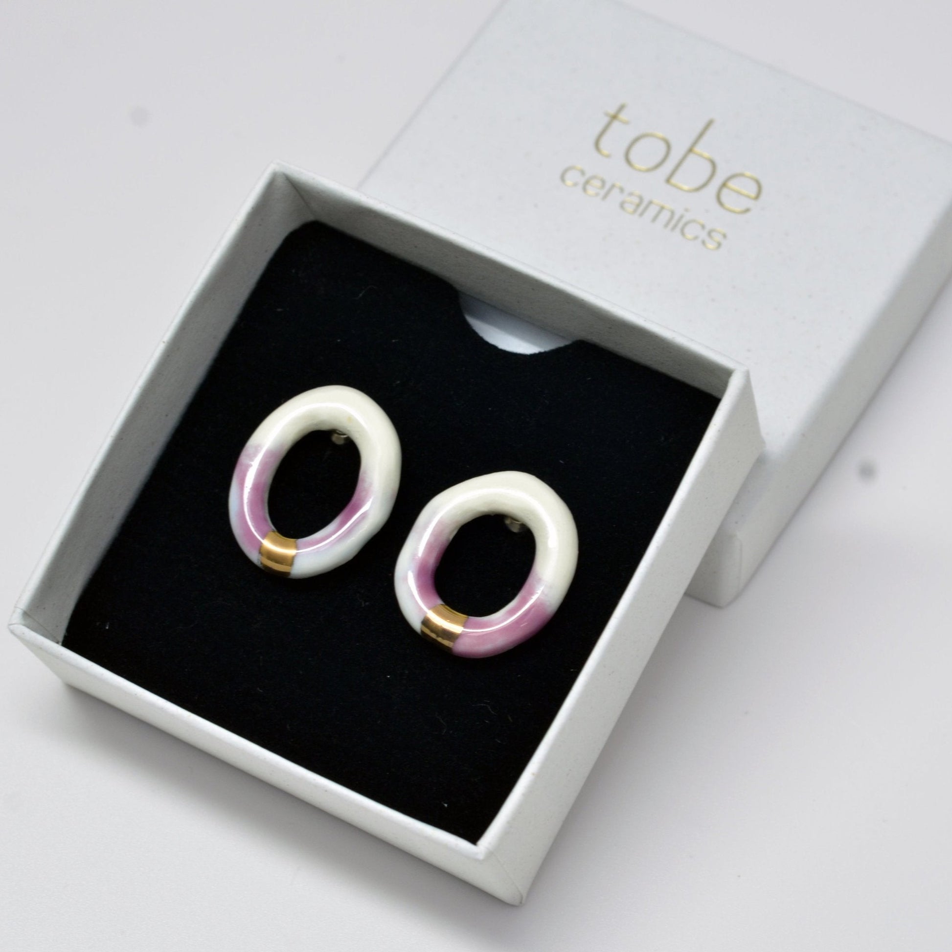 youthful innocence porcelain earring stud hoop white pink gold luster