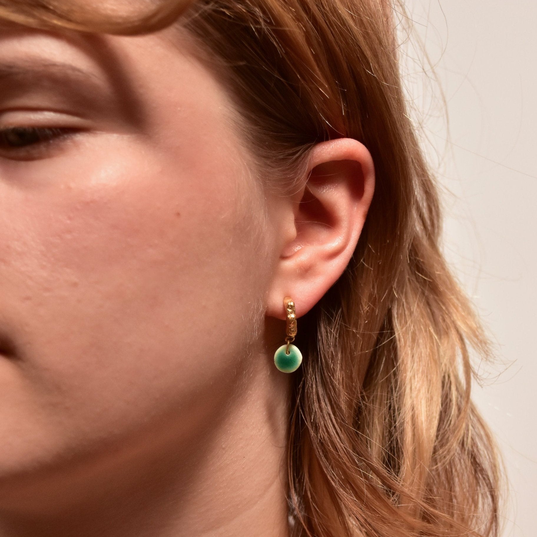 organic gold hoop earring round porcelain pendant green