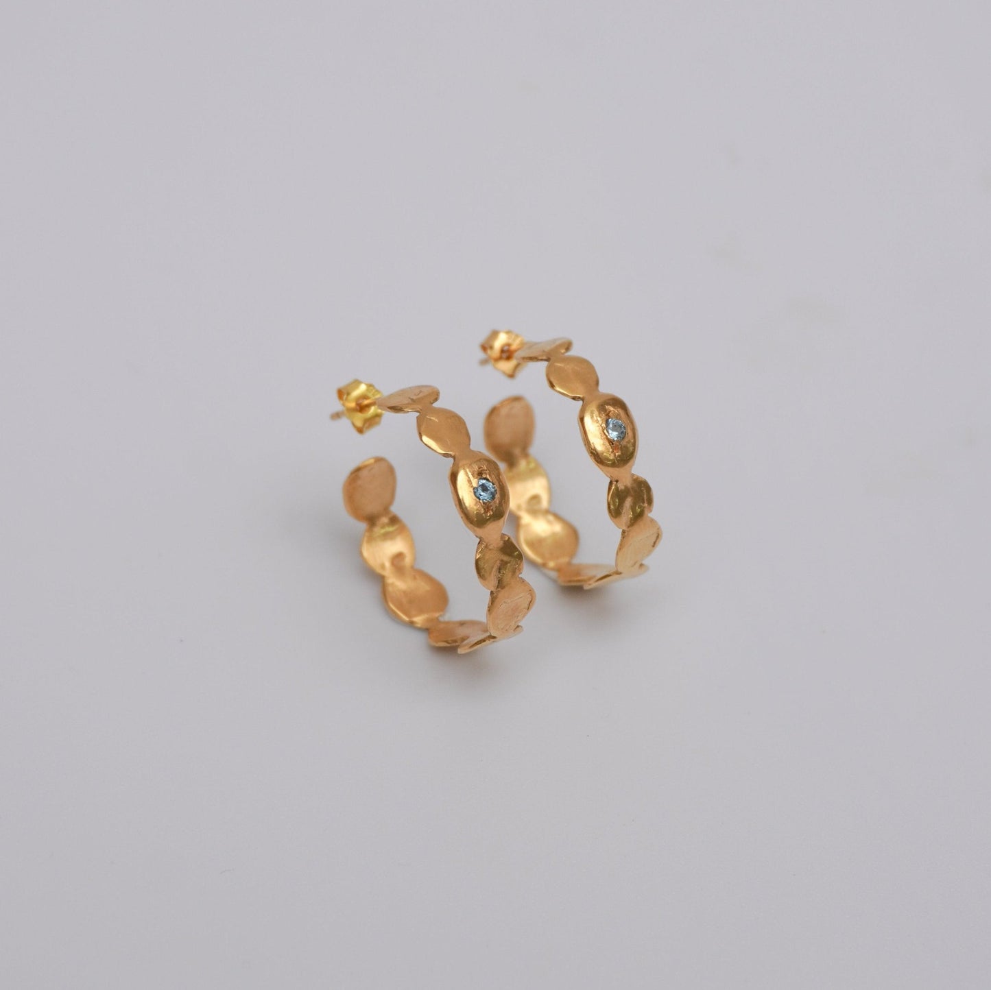 organic gold hoop earring round simplicity stone