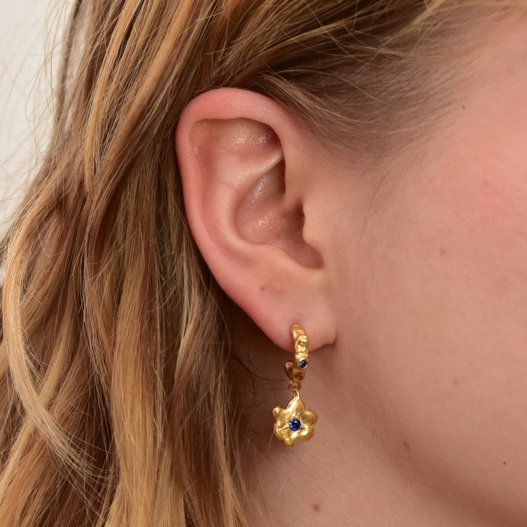 organic gold hoop earring flower pendant stone