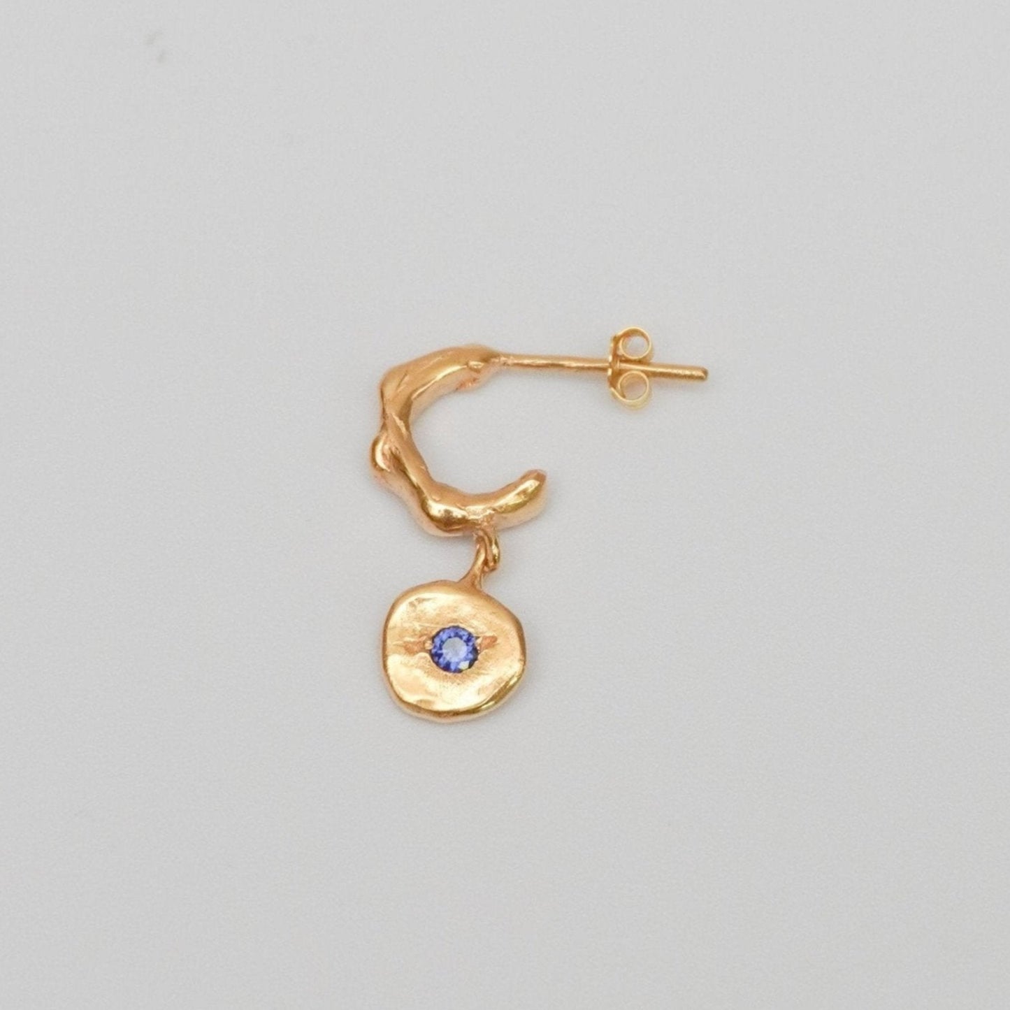 organic gold hoop earring round pendant stone