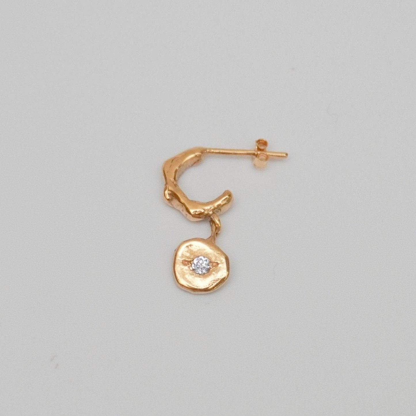 organic gold hoop earring round pendant stone