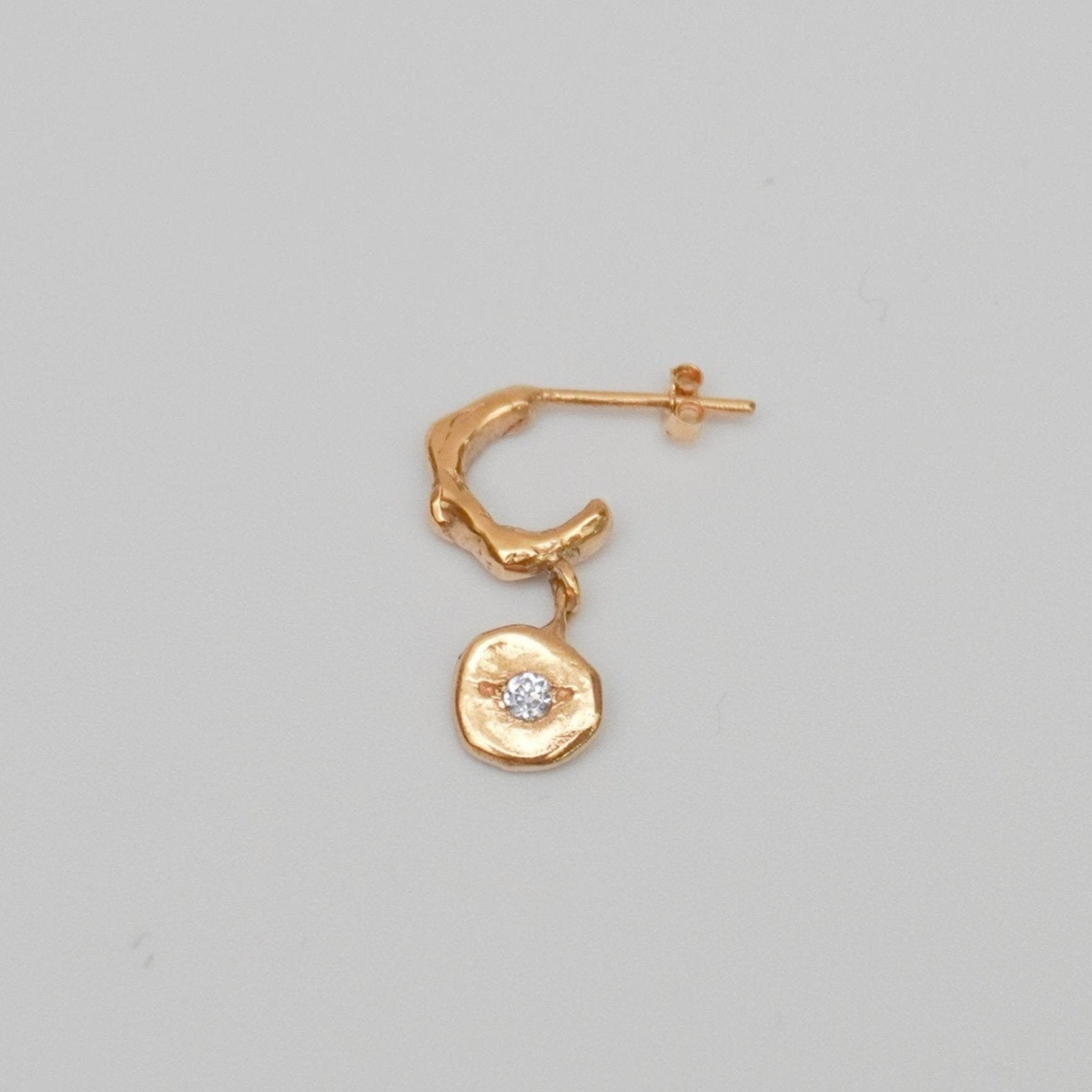 organic gold hoop earring round pendant stone