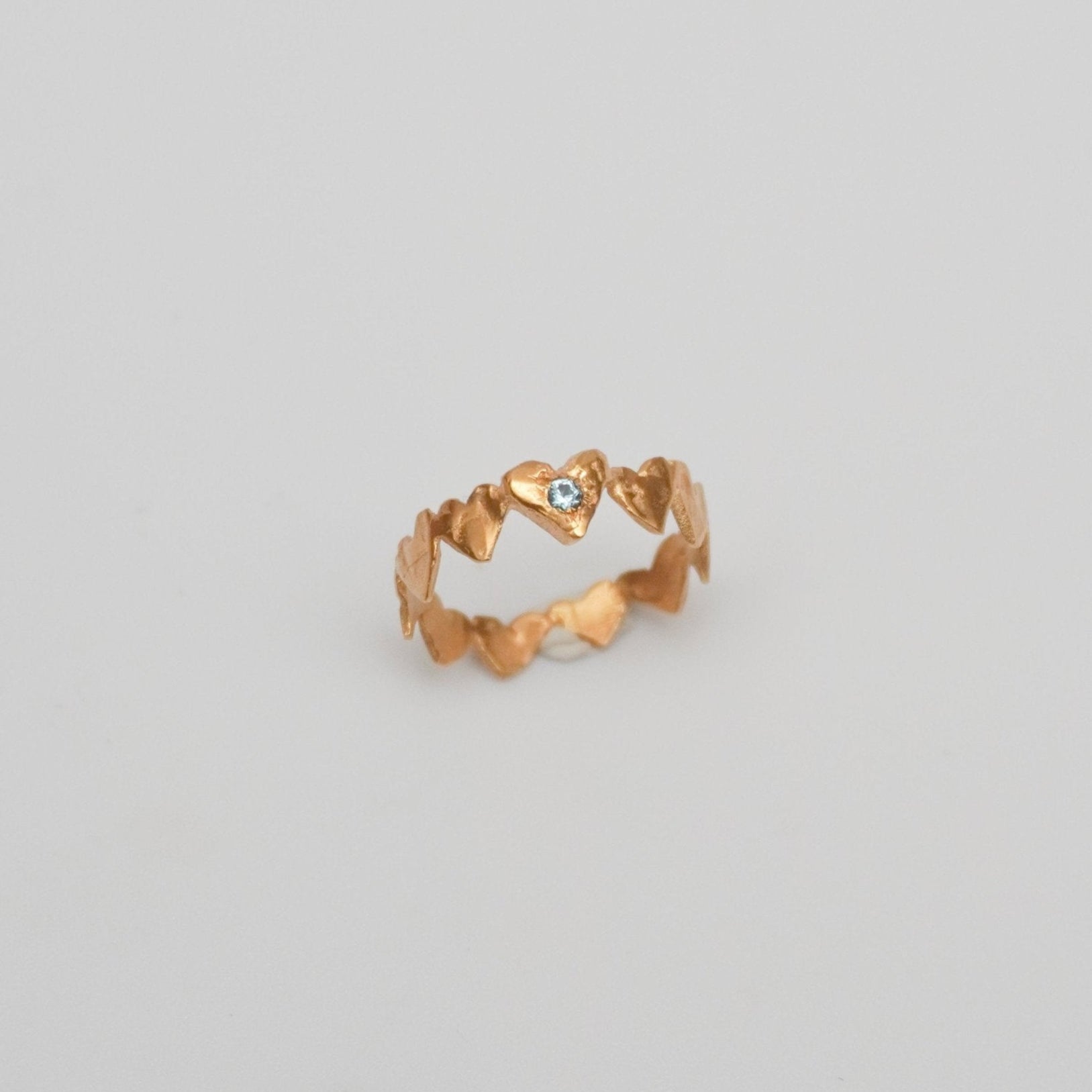 organic love gold ring heart light blue stone