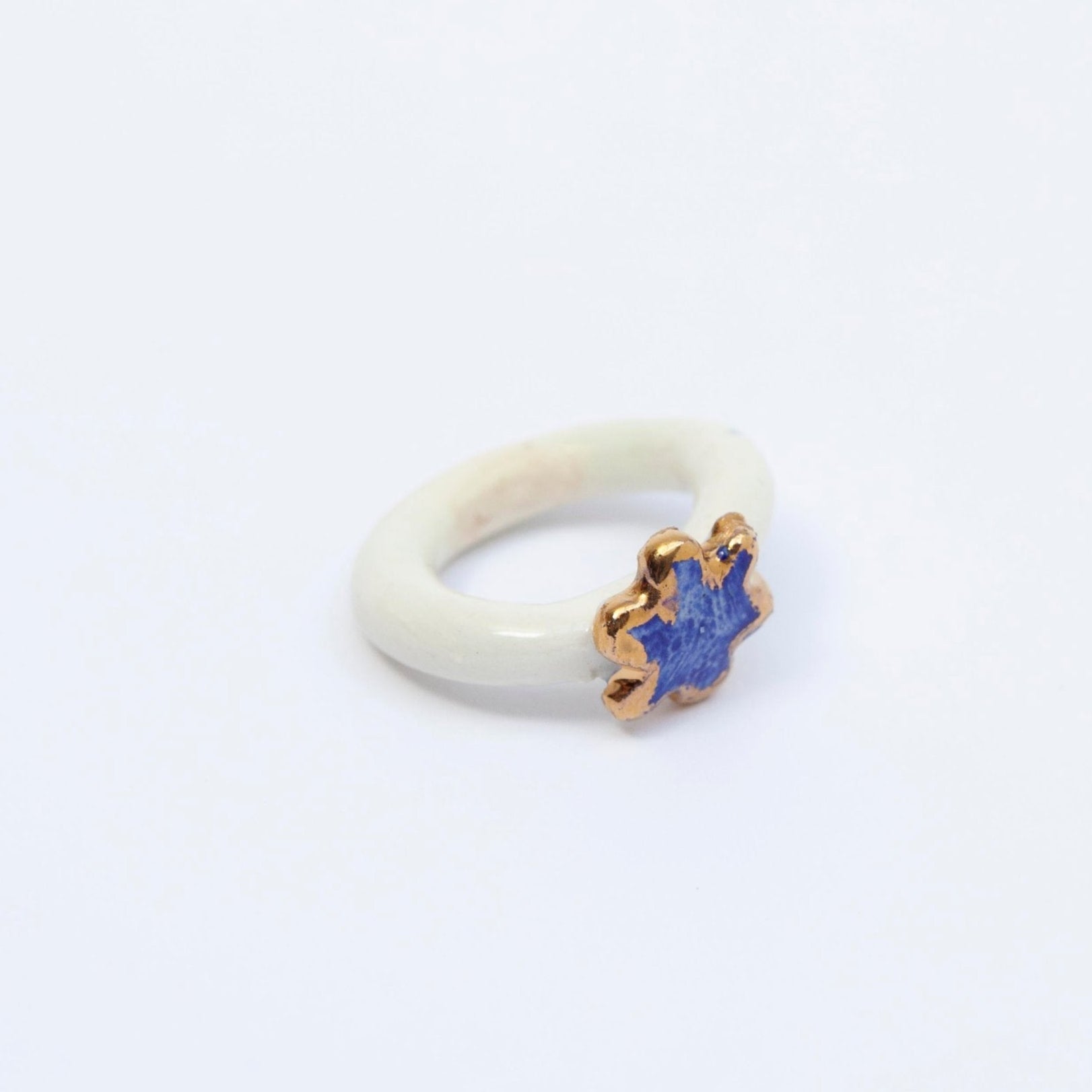 organic porcelain ring kindness flower blue white gold