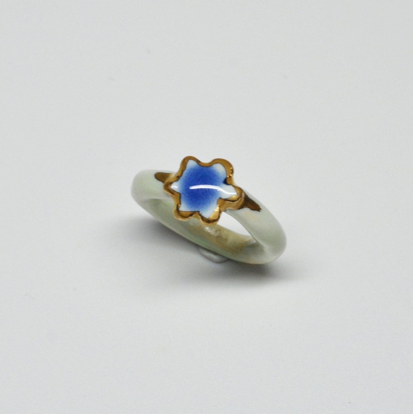 organic porcelain ring kindness flower blue gold white