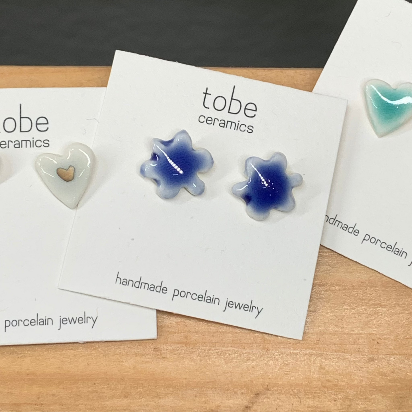 organic porcelain stud earring kindness love flower heart blue silver luster detail