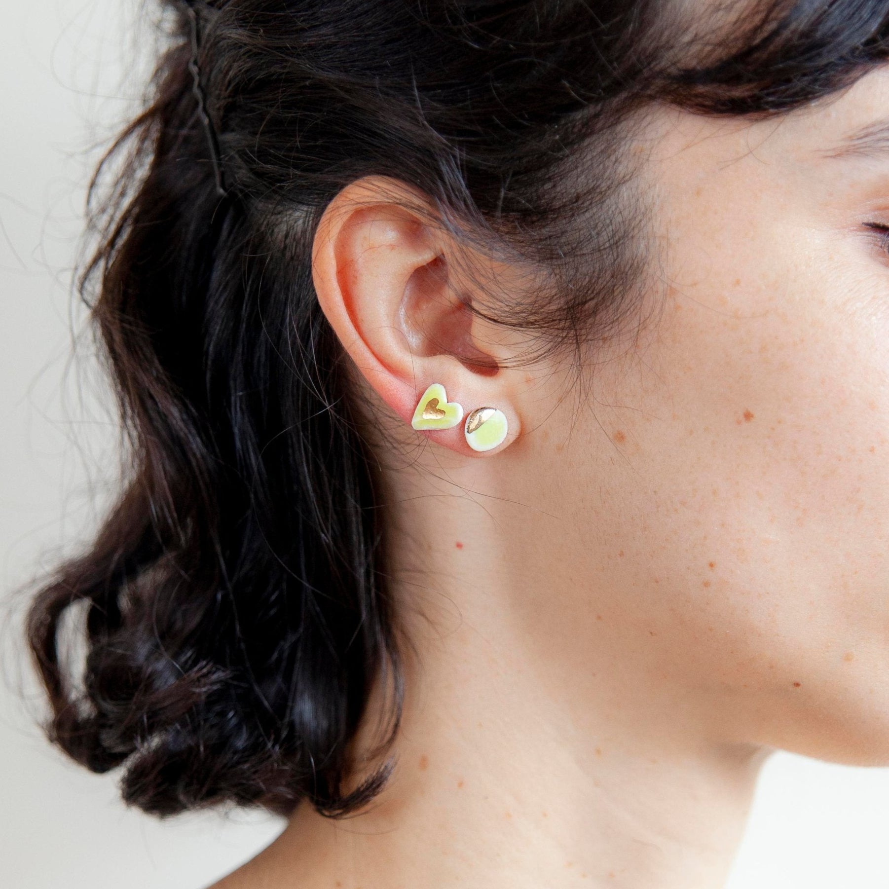 organic porcelain stud earring kindness simplicity flower round luster detail yellow gold