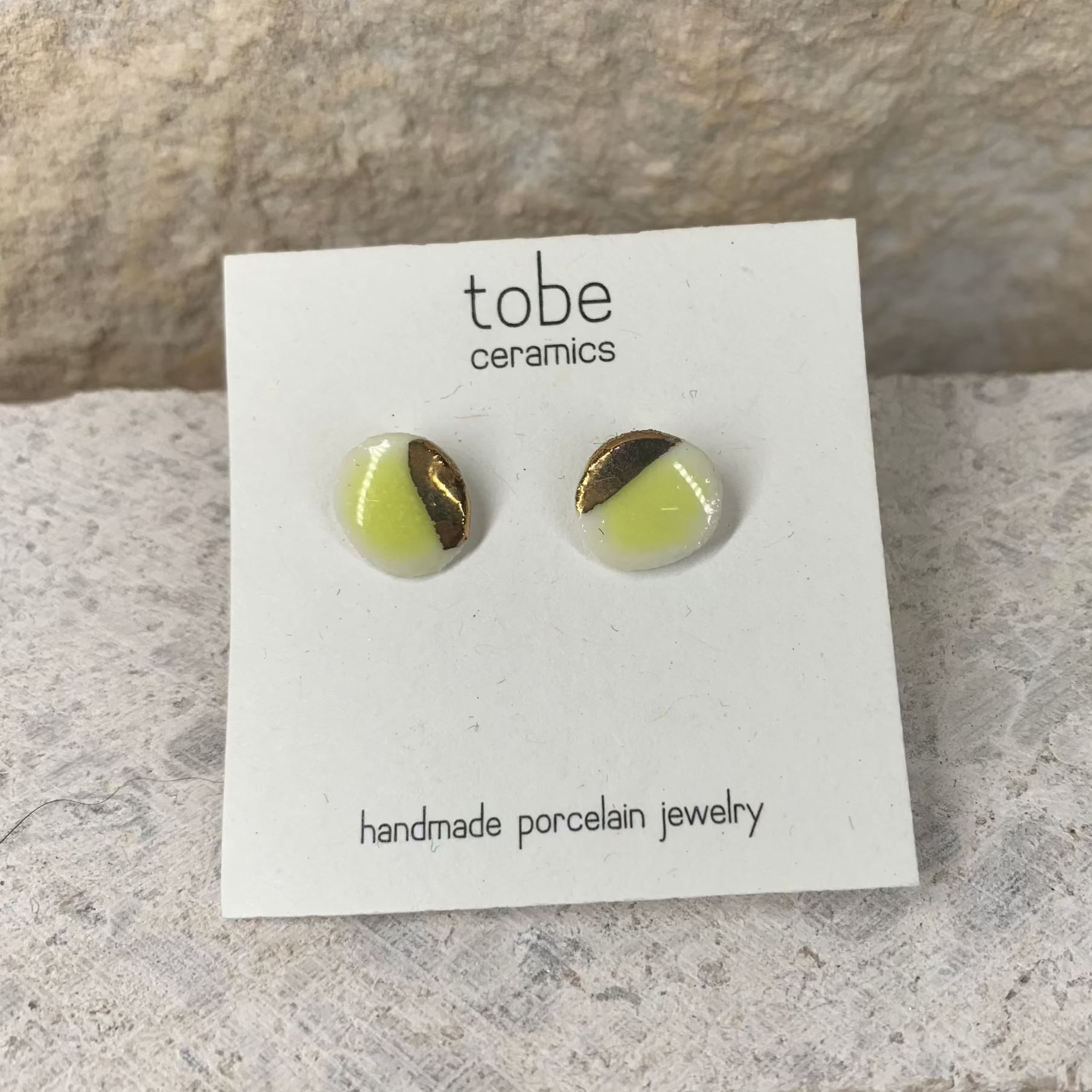 organic porcelain stud earring simplicity round yellow gold luster detail