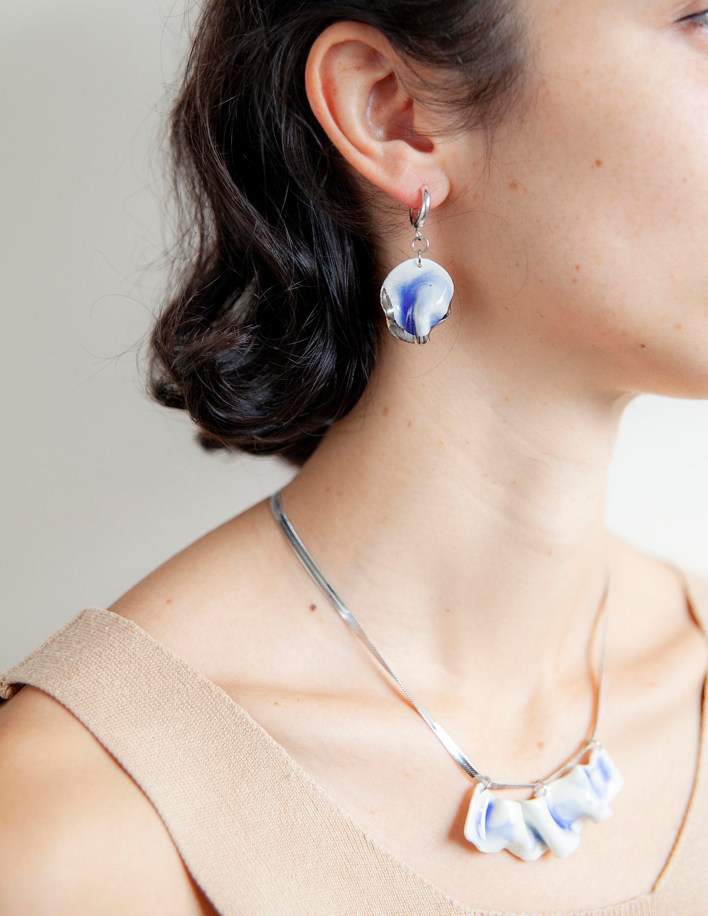 resilience porcelain necklace.