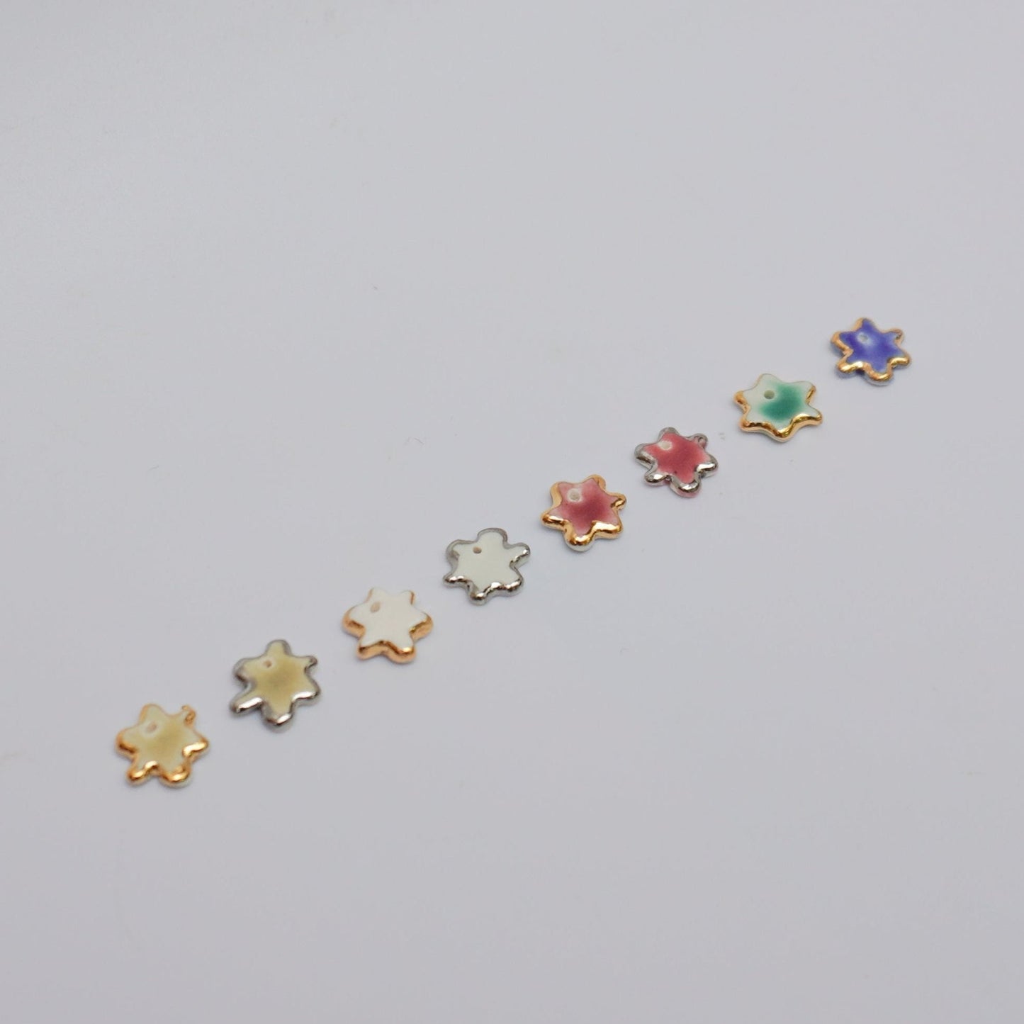 Porcelain pendants with gold/silver lusters
