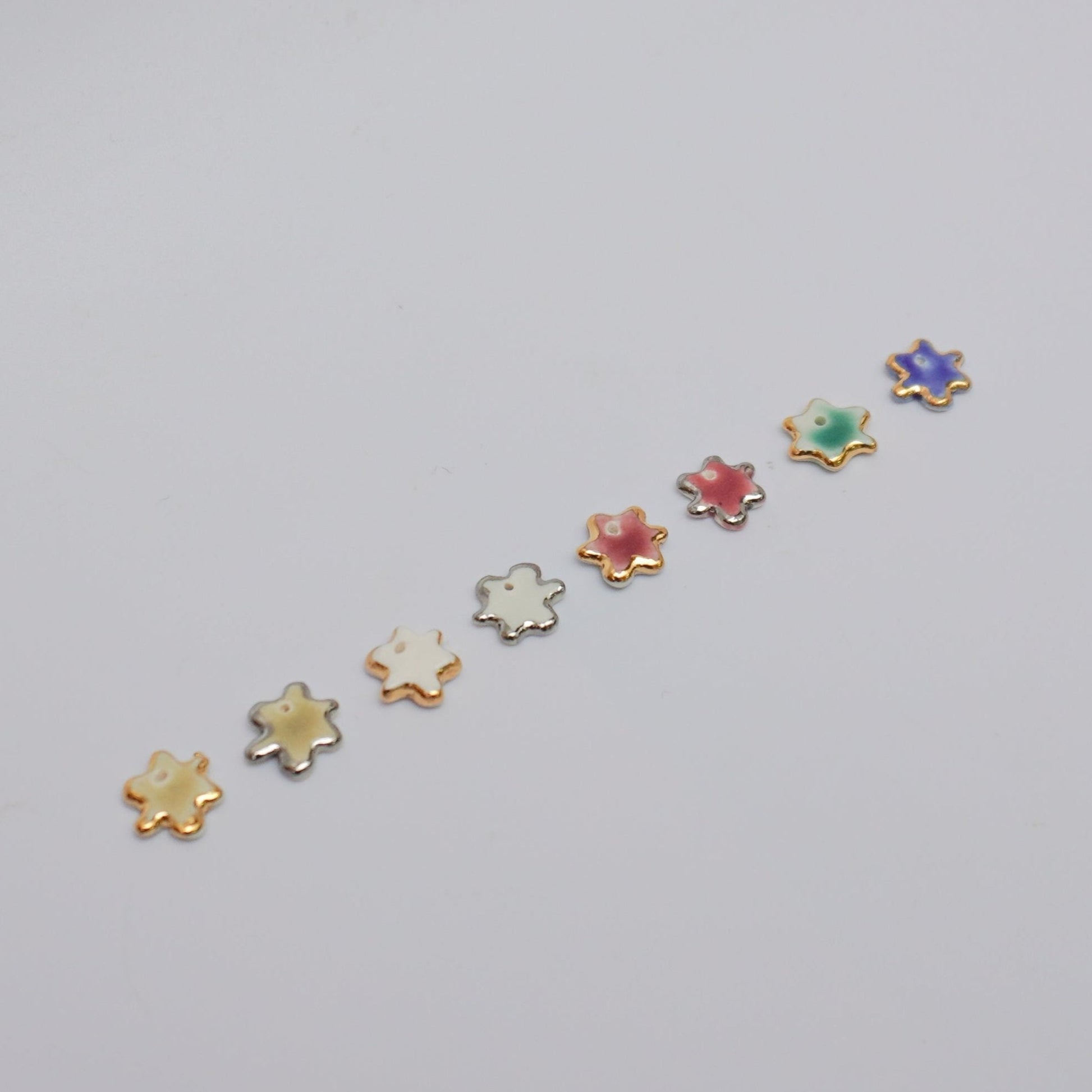 Porcelain pendants with gold/silver lusters