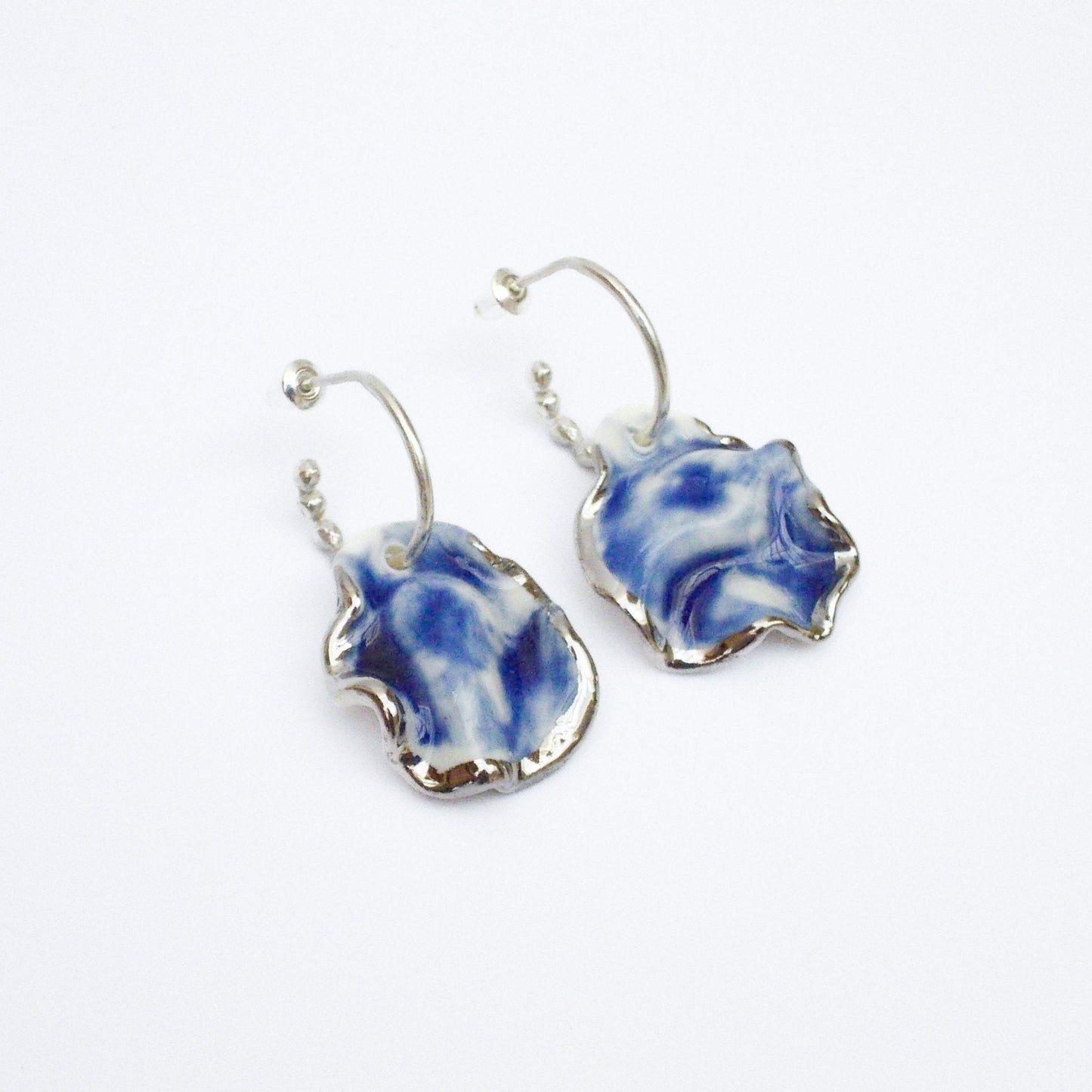resilience midnight calm earring blue porcelain silver luster hoop