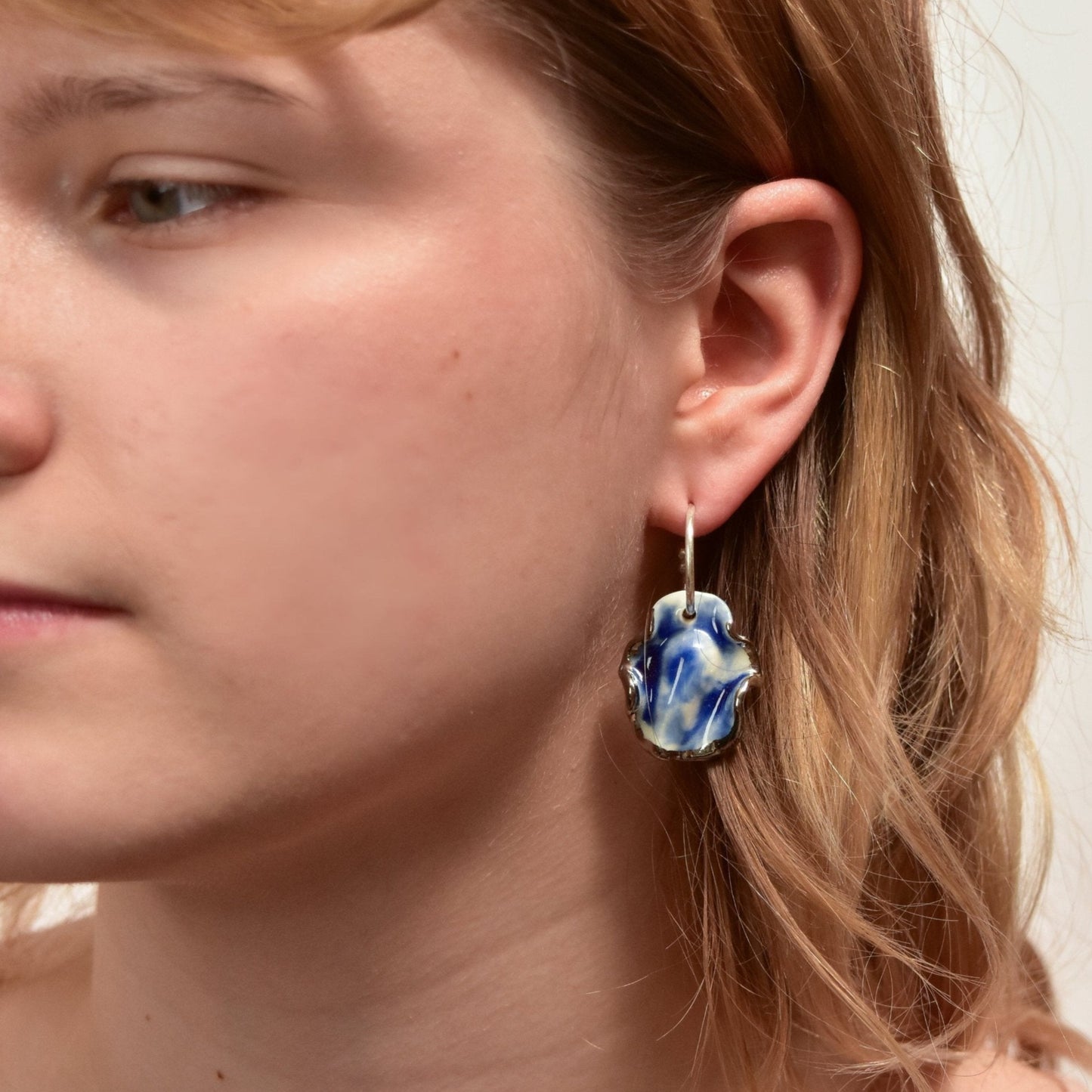 resilience midnight calm porcelain earring silver luster hoop