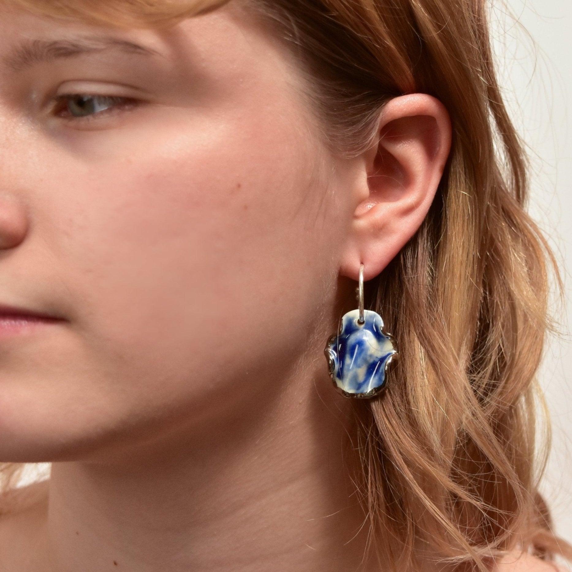 resilience midnight calm porcelain earring silver luster hoop