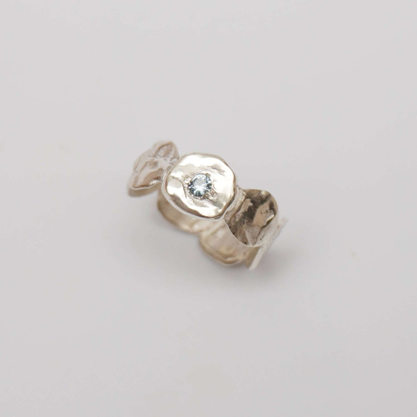 Simplicity Greek ring in silver showcasing shapes with synthetic zirconia gemstone.