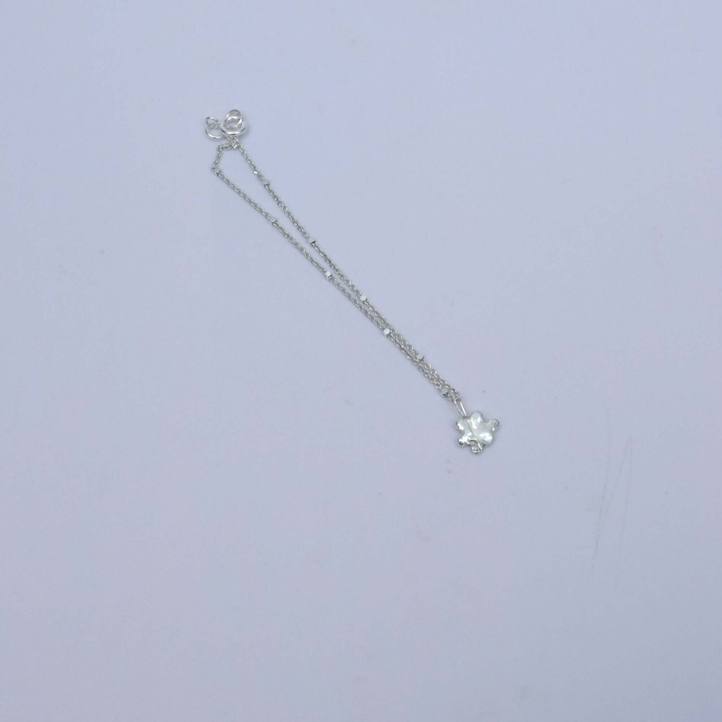 Silver bracelet with little pendant - flower