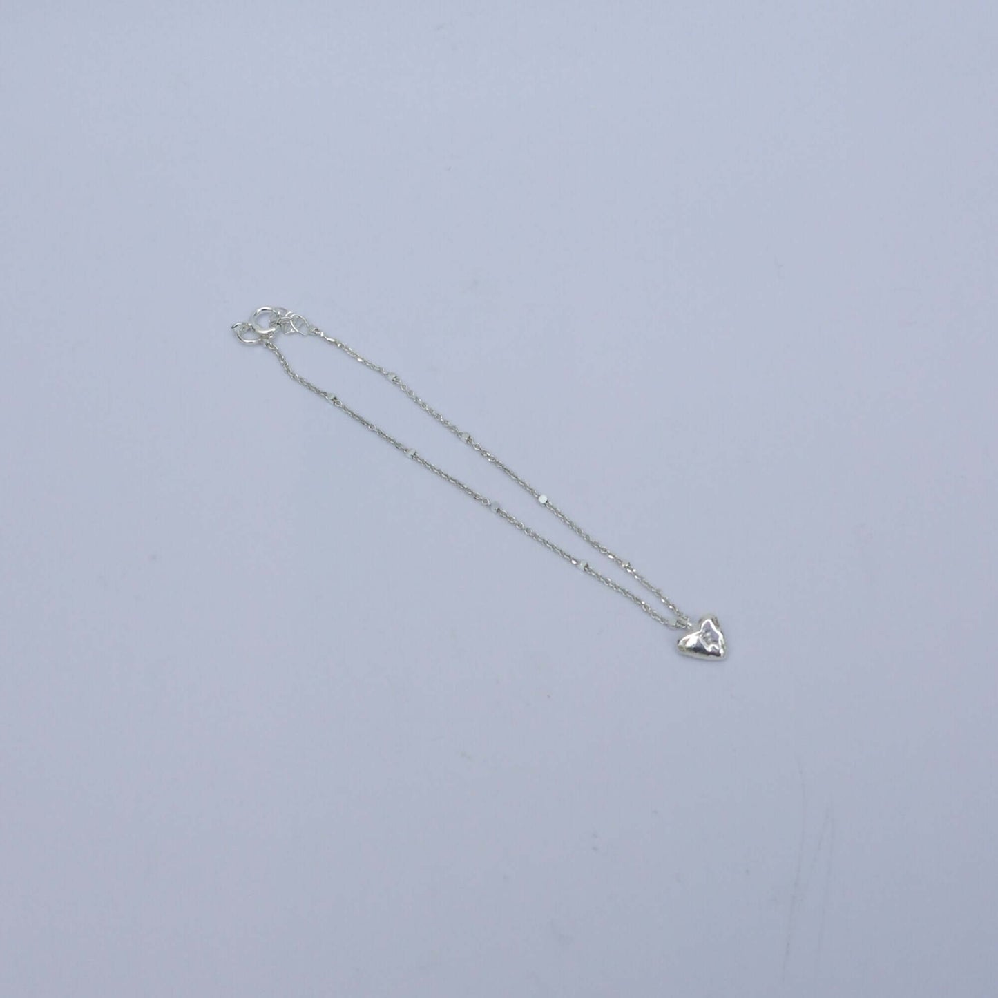 Handmade silver bracelet with little pendant - heart