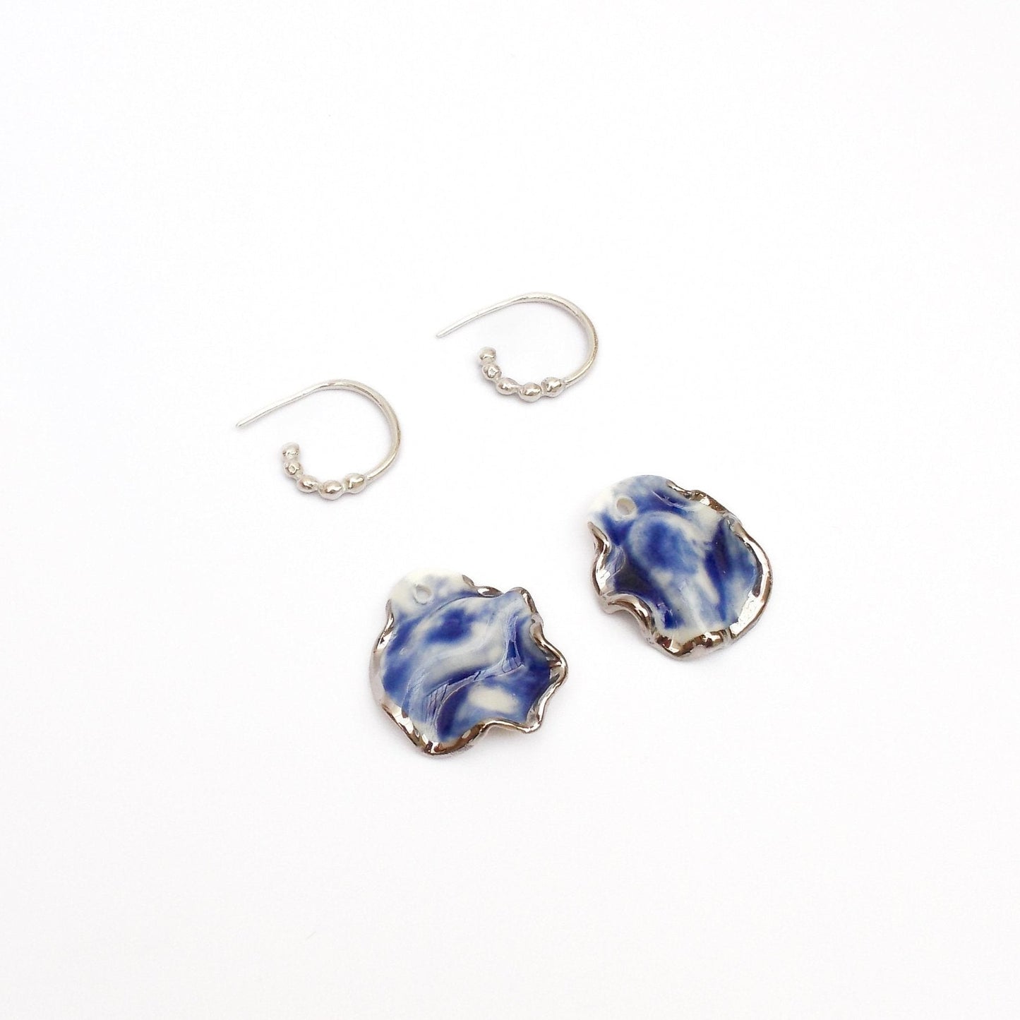 resilience midnight calm blue porcelain earring luster silver