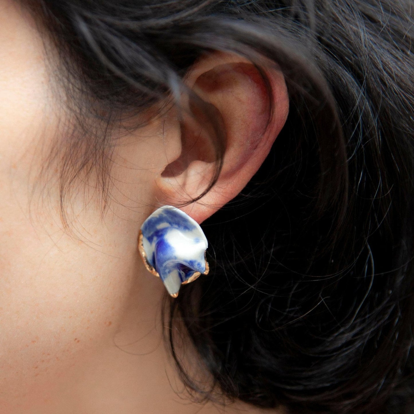 midnight calm resilience earring blue gold luster