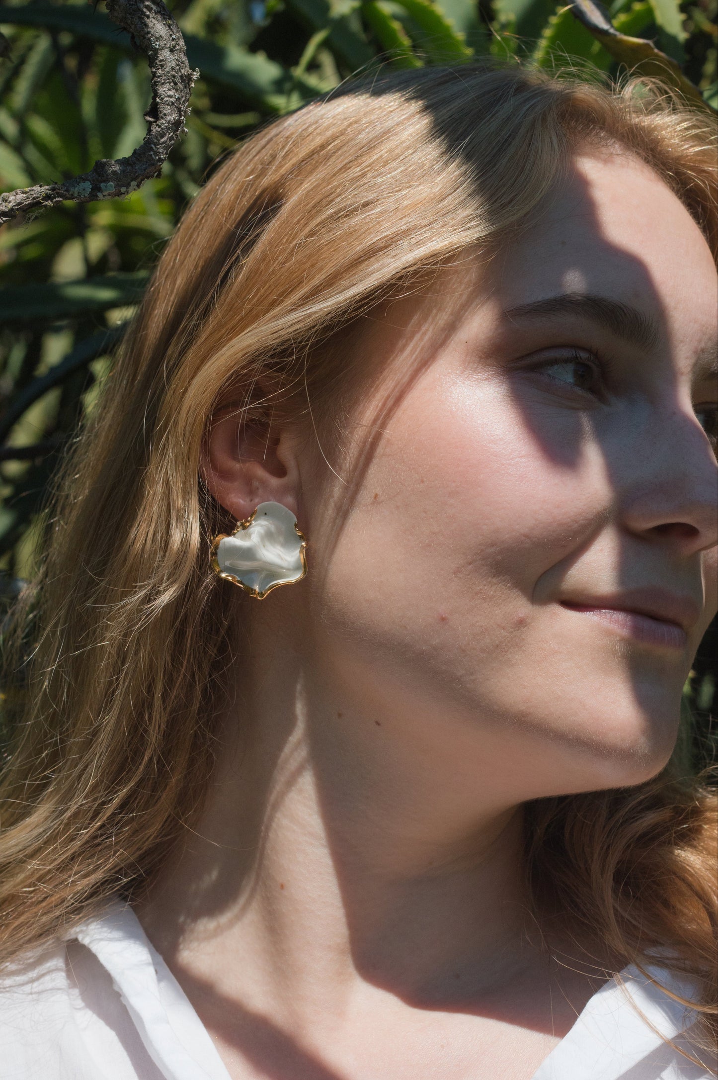 silent strenght handmade porcelain earrings with gold luster