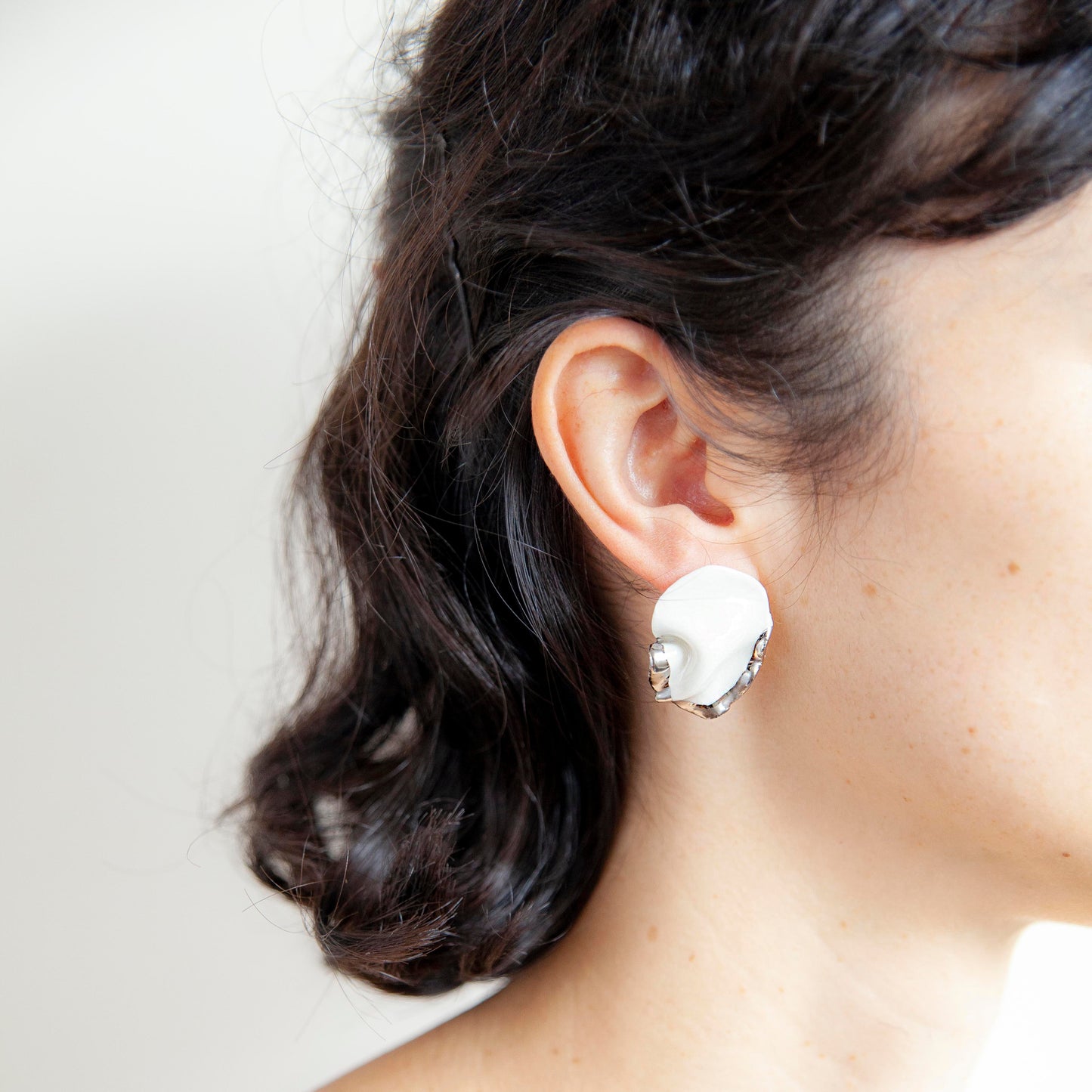 silent strenght handmade porcelain earrings with silver luster