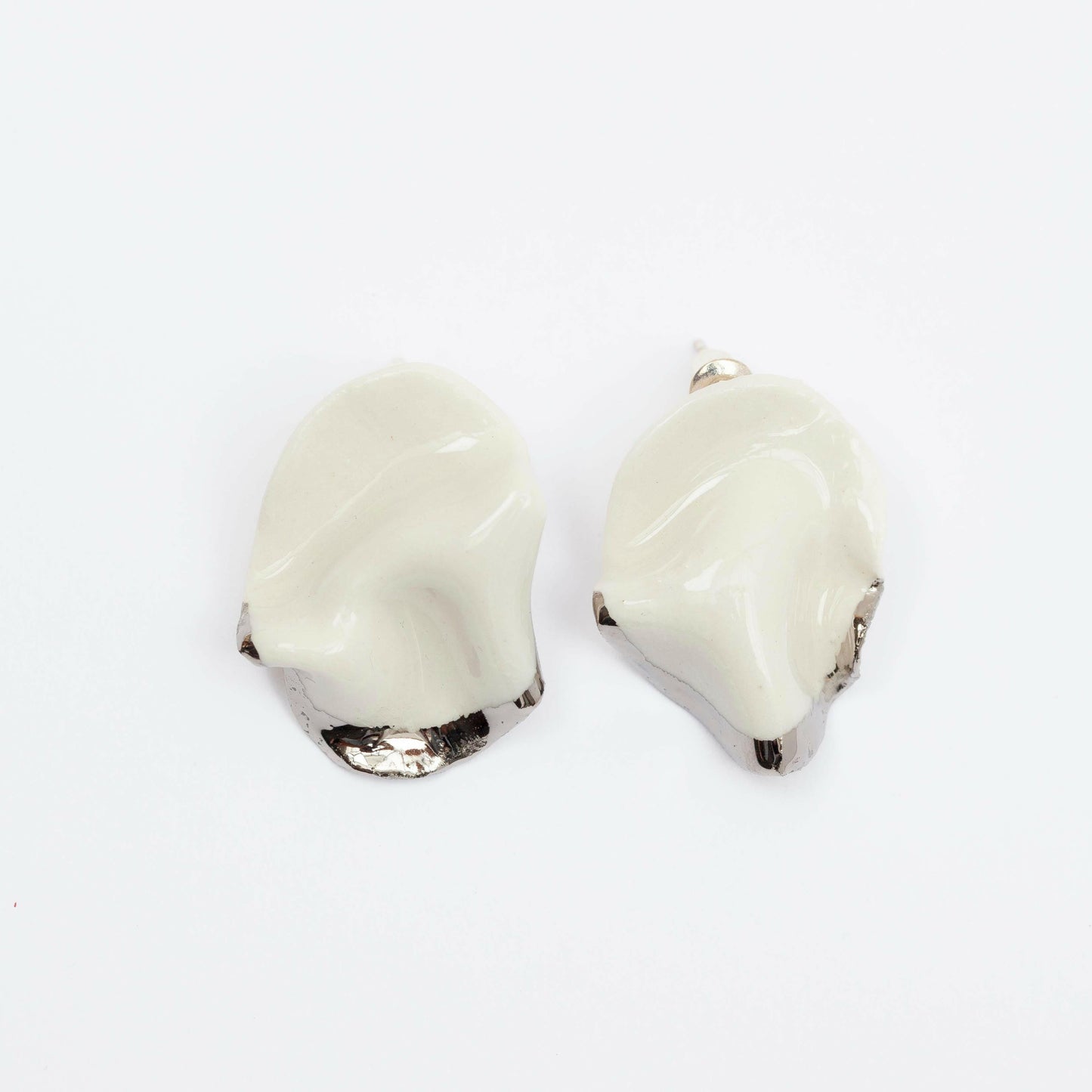 silent strenght handmade porcelain earrings with silver luster
