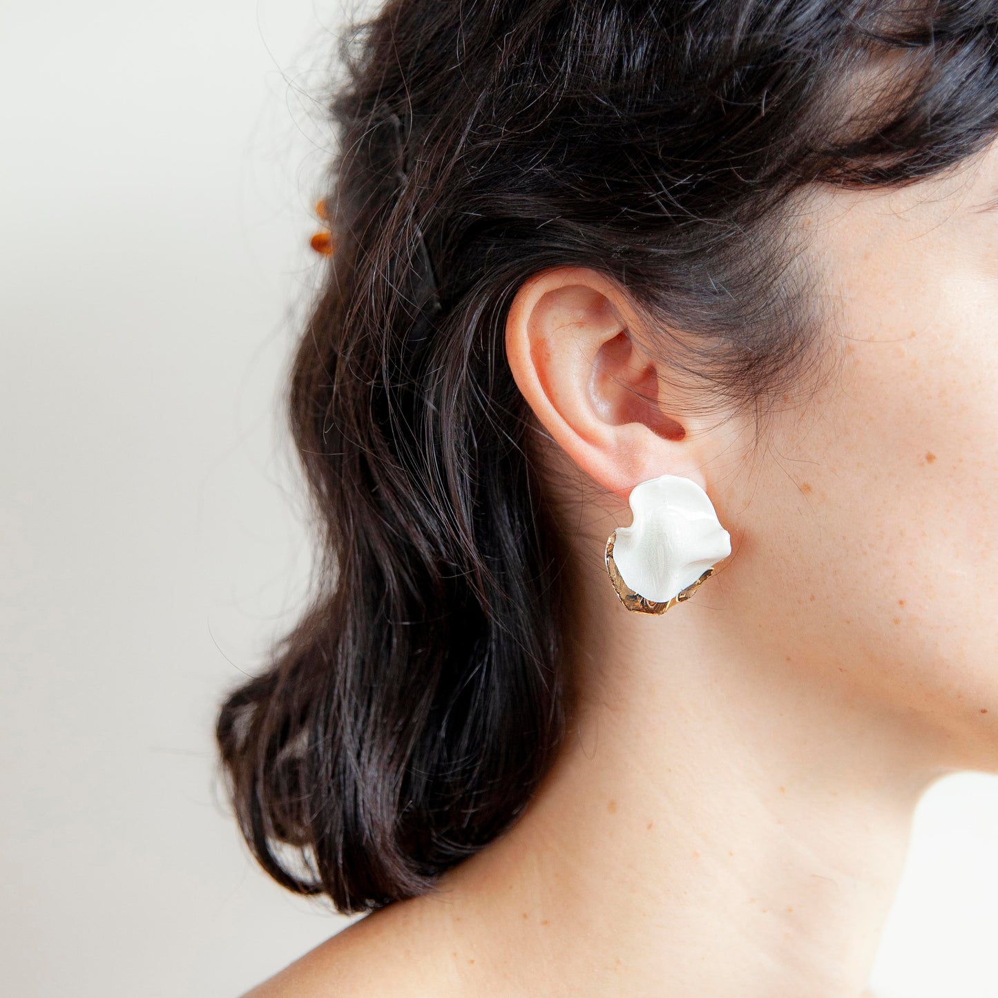 silent strenght handmade porcelain earrings with gold luster