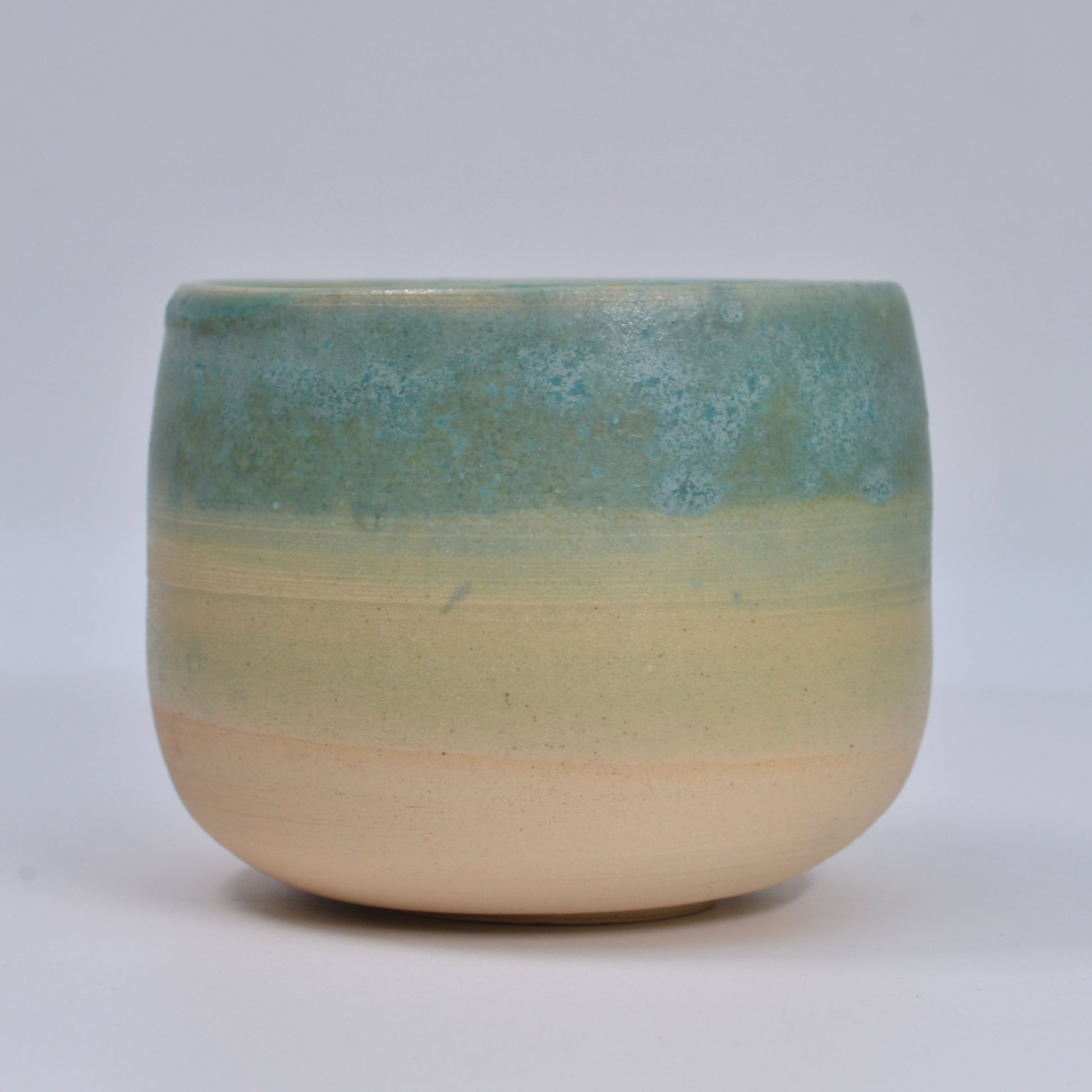 washed out green cup.