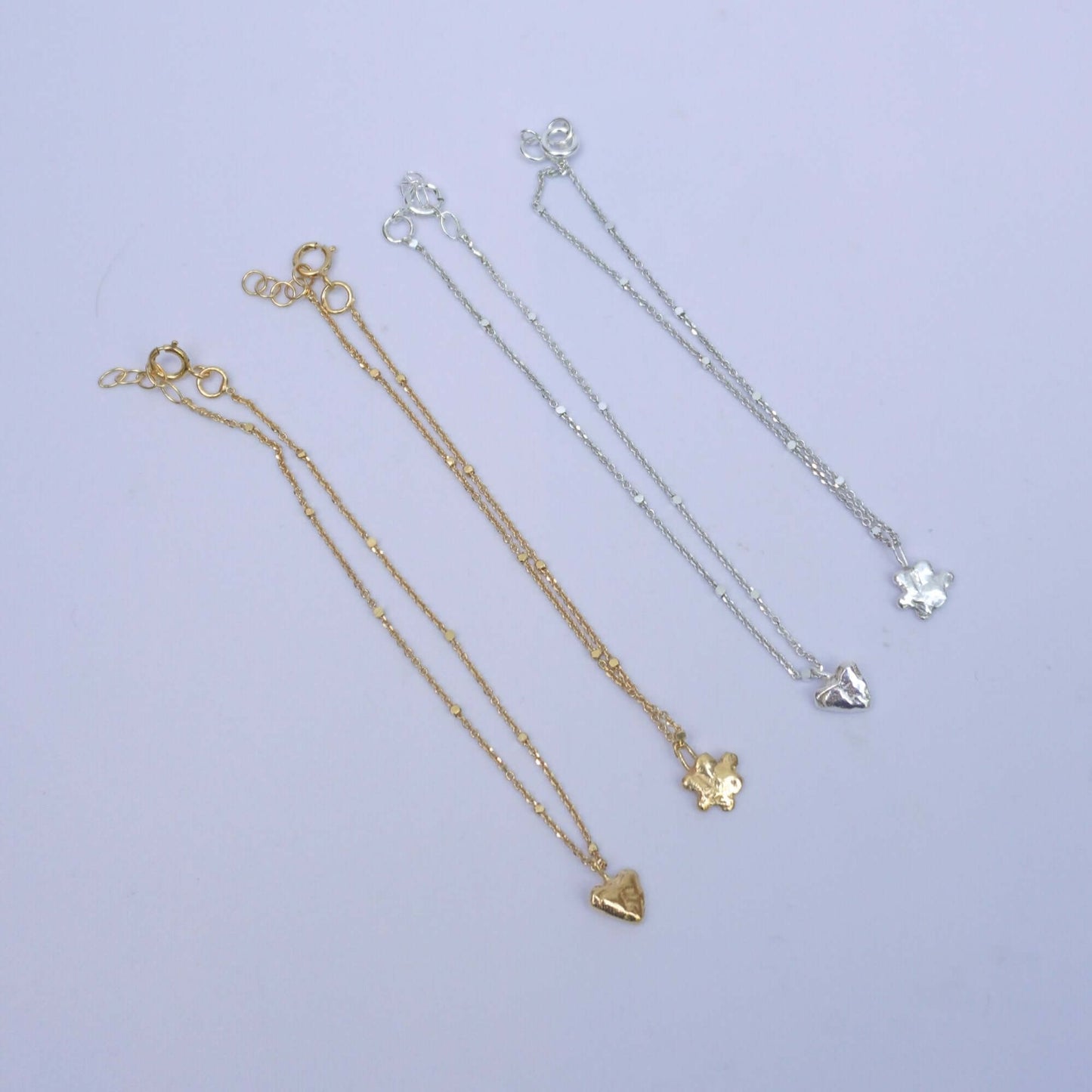 Gold-plated silver and silver bracelets with little pendant - heart, flower