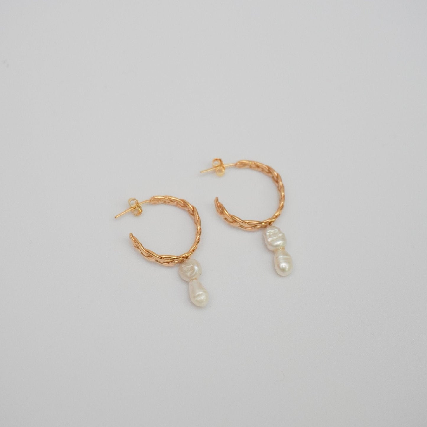 Braided hoop earrings with pearls drops