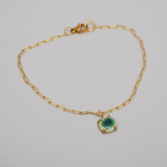 Bracelet with porcelain pendant