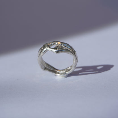 Handcrafted organic openwork silver ring with sculpted natural shapes