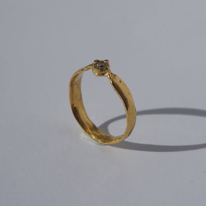 Handcrafted gold-plated ring with organic band and customizable gemstone