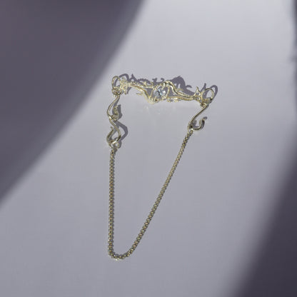 Gold-plated handcrafted choker with organic sculptural centerpiece and a hand-set stone