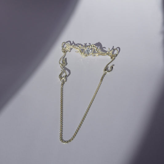 Gold-plated handcrafted choker with organic sculptural centerpiece and a hand-set stone