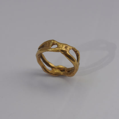 Handcrafted organic openwork gold-plated ring with sculpted natural shapes